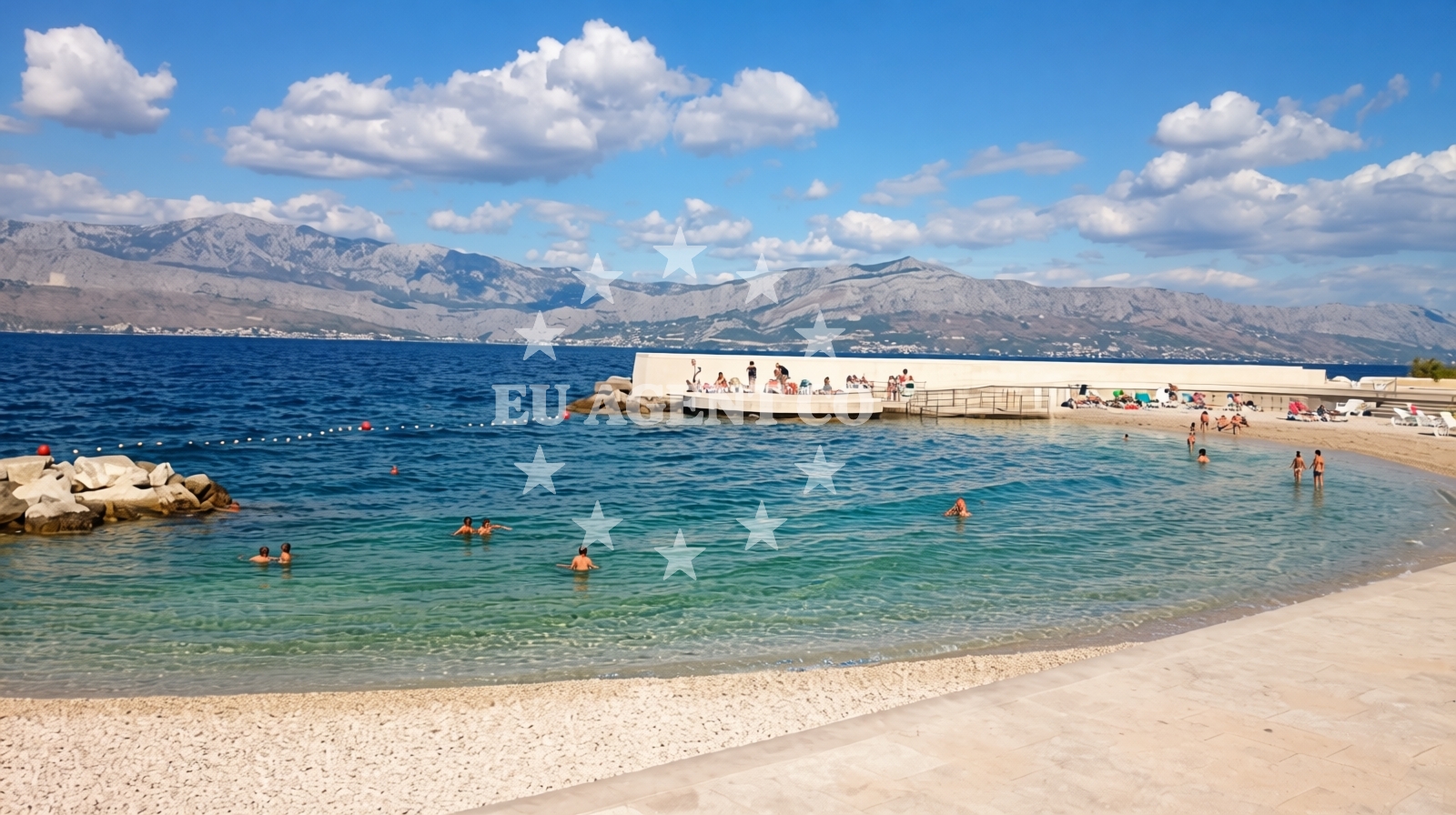 Restaurant in Postira, Brač, overlooking the Adriatic Sea with white stone houses in the background