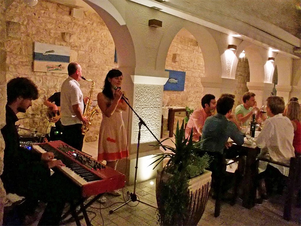 Dining area at Passarola Restaurant overlooking the Adriatic Sea