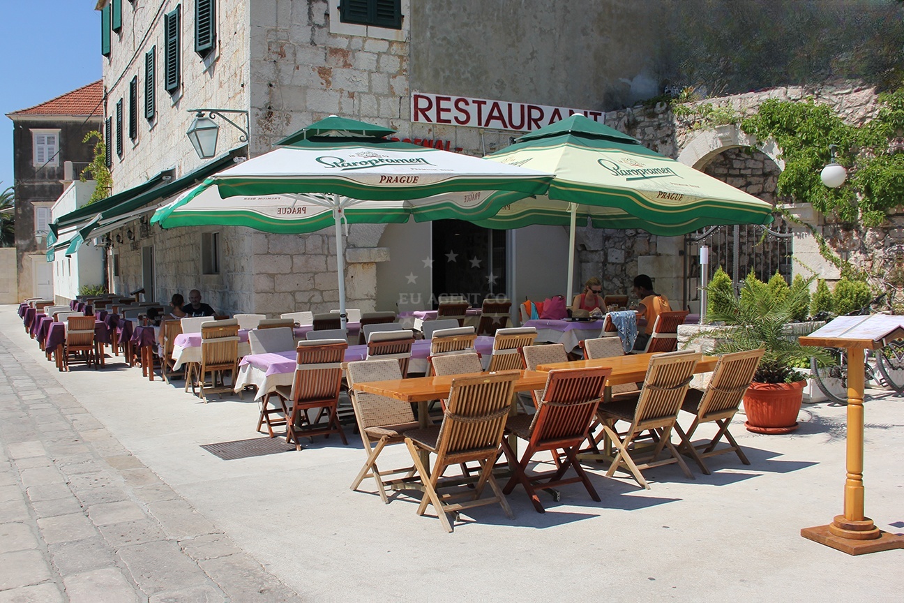 Arsenal Restaurant in Jelsa, Hvar, with views of the historic town and harbor