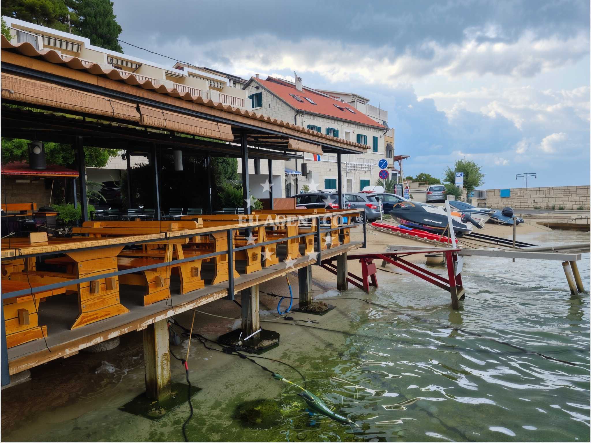 Sailboat moored near the restaurant in Pisak, Central Dalmatia