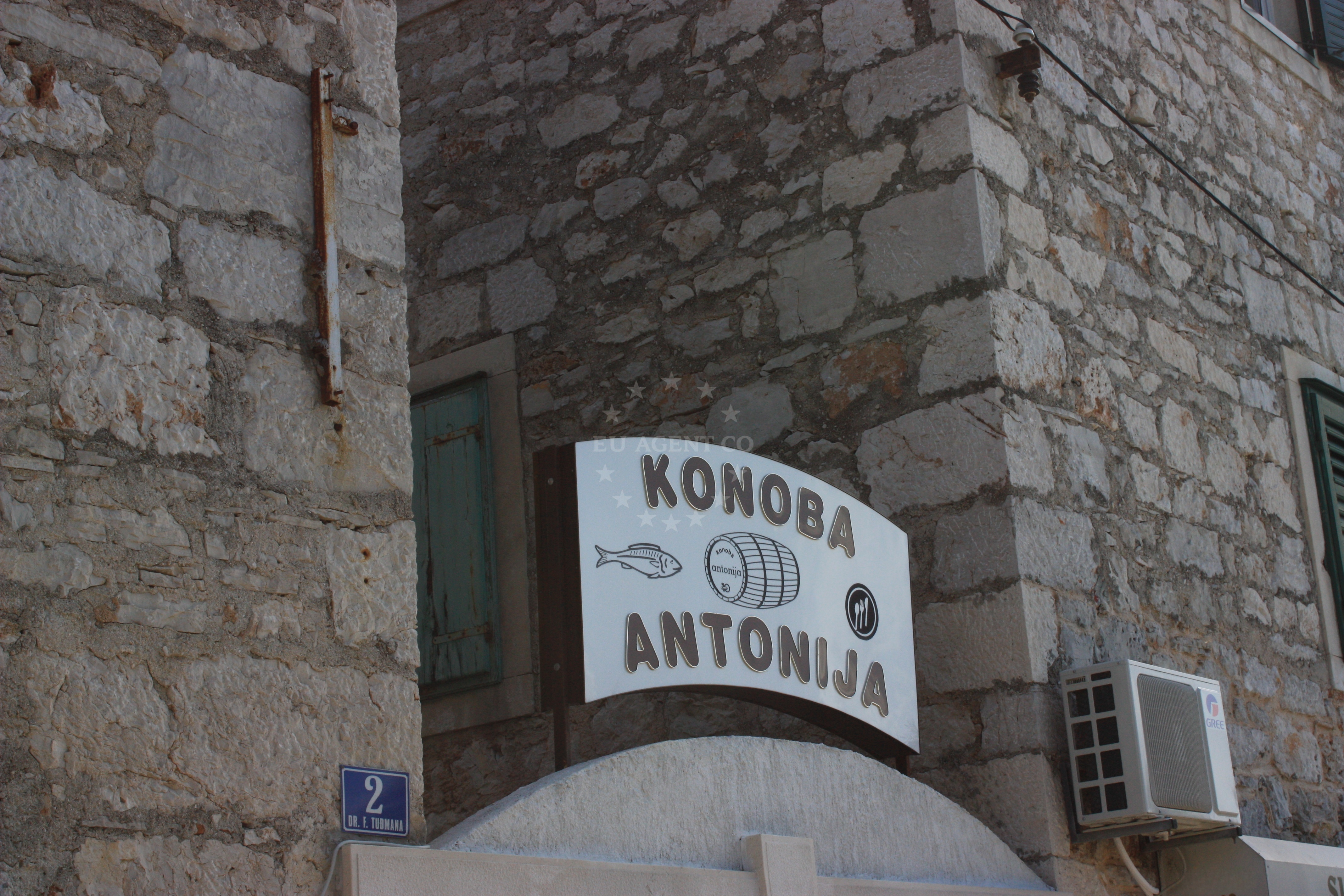 Dining area at Konoba Antonija with views of the Adriatic Sea