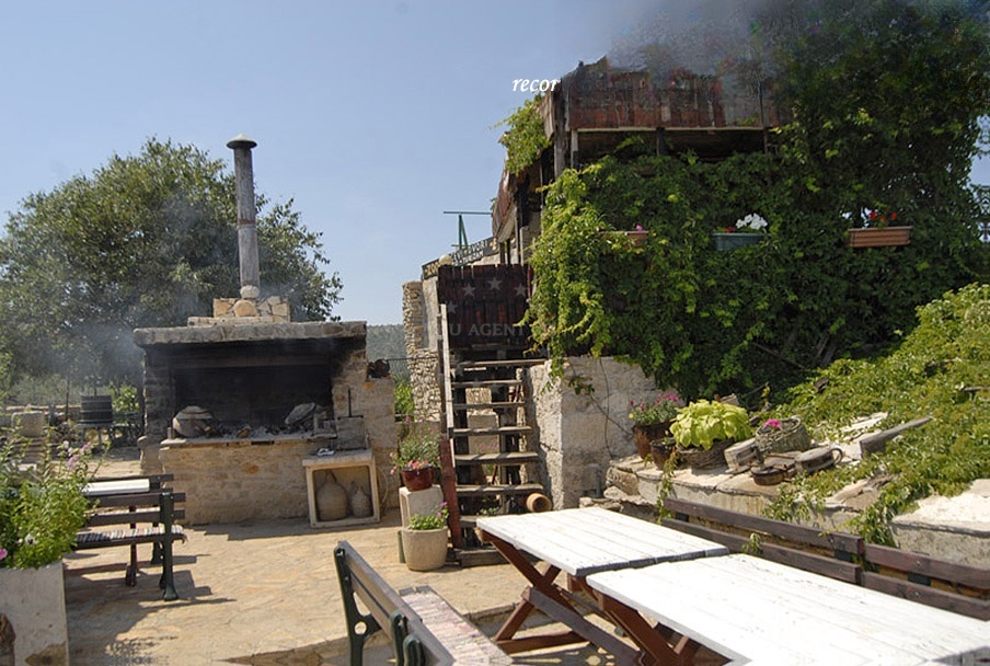 Interior of Saricevi dvori restaurant with rustic decor