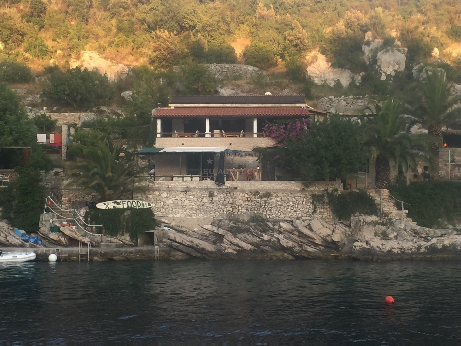 Stone house with pine forest backdrop at Lonely Paradise, Šolta