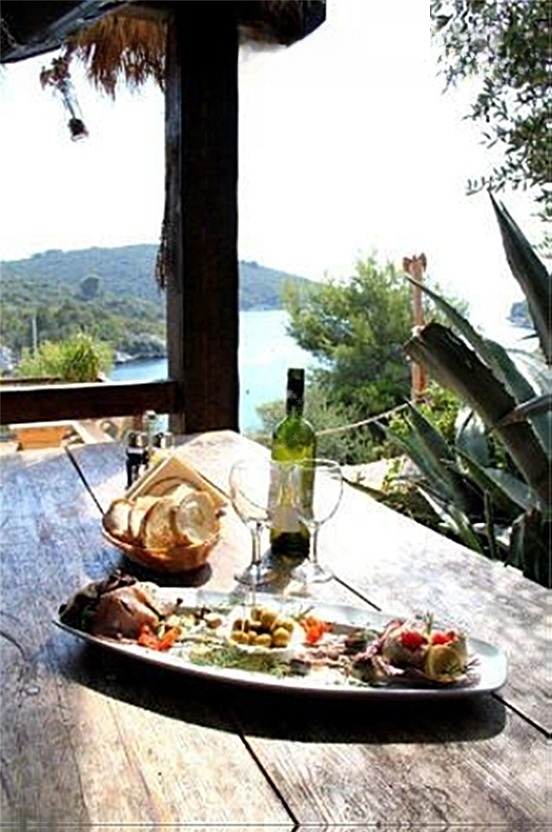 Interior of Restaurant Sismis with panoramic windows facing Sesula Bay
