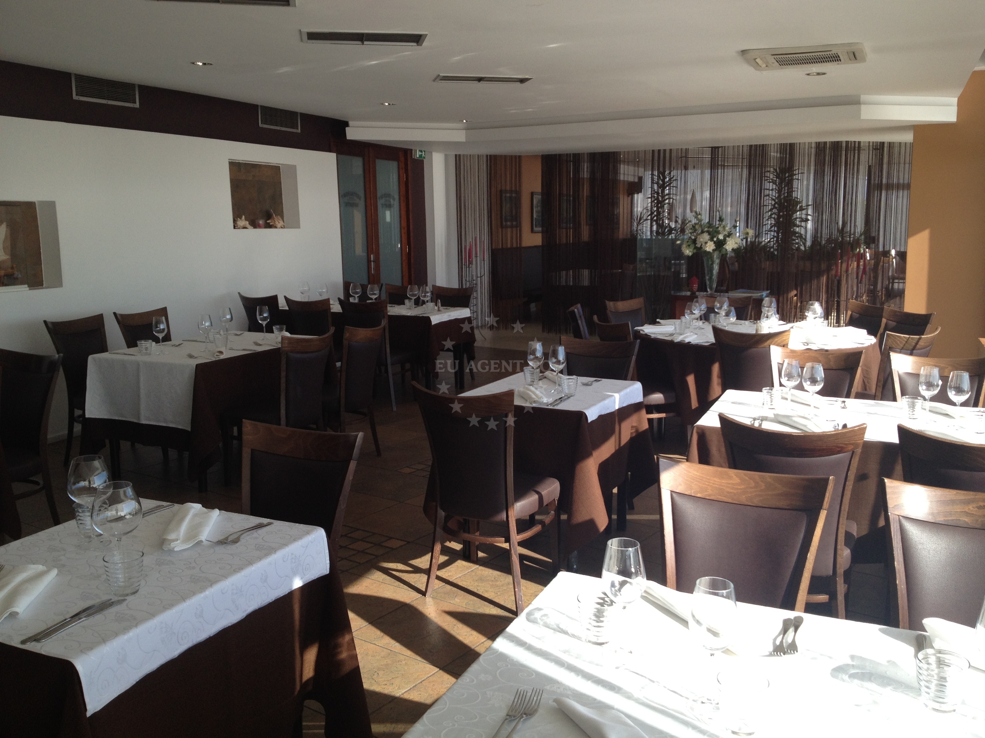 Dining area at Adriatic-Graso with panoramic views of Split's city lights and islands
