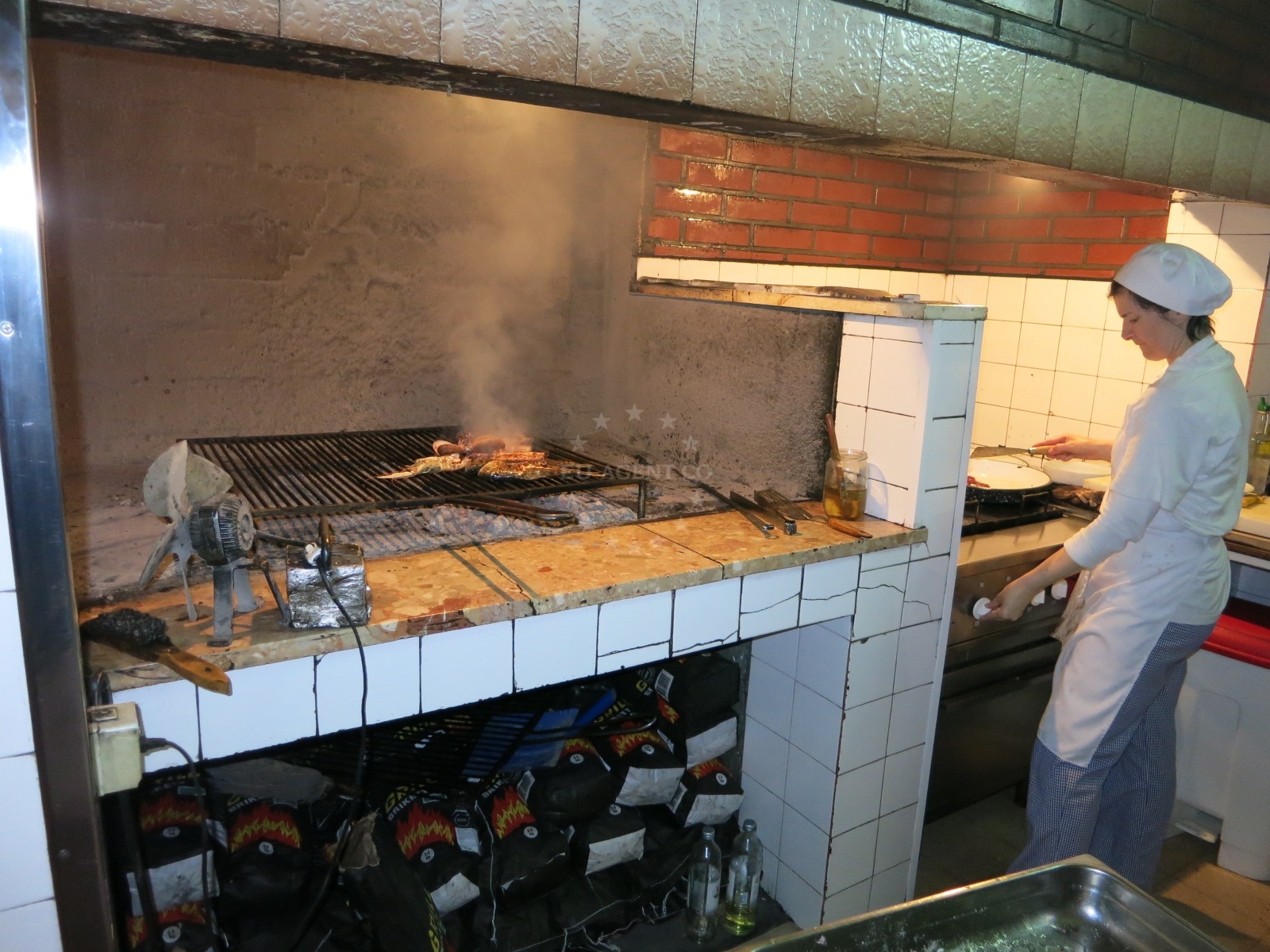 Barba Restaurant in Trogir, Central Dalmatia, overlooking the Adriatic Sea with a grill on an open fireplace