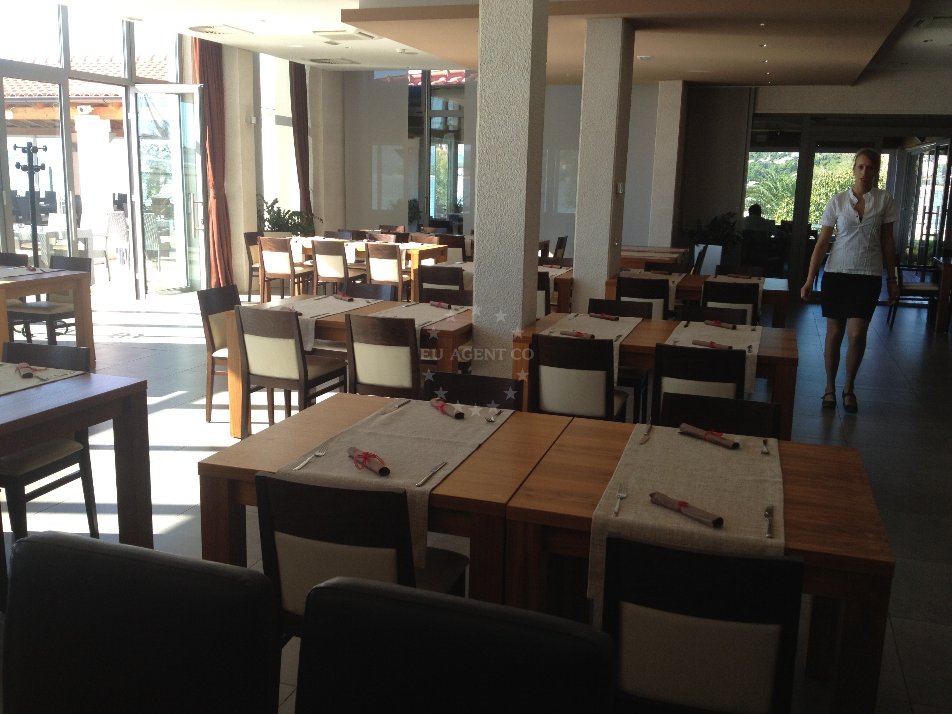 Restaurant terrace overlooking Trogir’s historic harbor