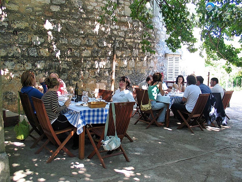 Dining area at Roki's Restaurant with rustic decor
