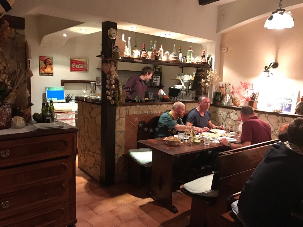 Cozy interior of Kod Paveta Restaurant with a focus on fresh, locally sourced dishes