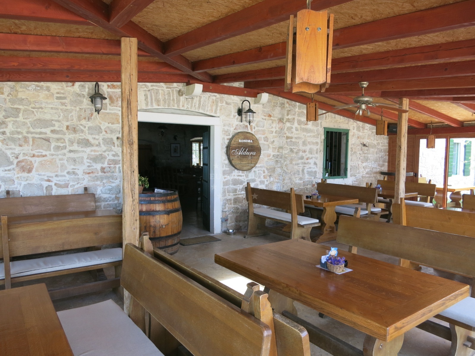 Dining area at Konoba Aldura with traditional Dalmatian decor