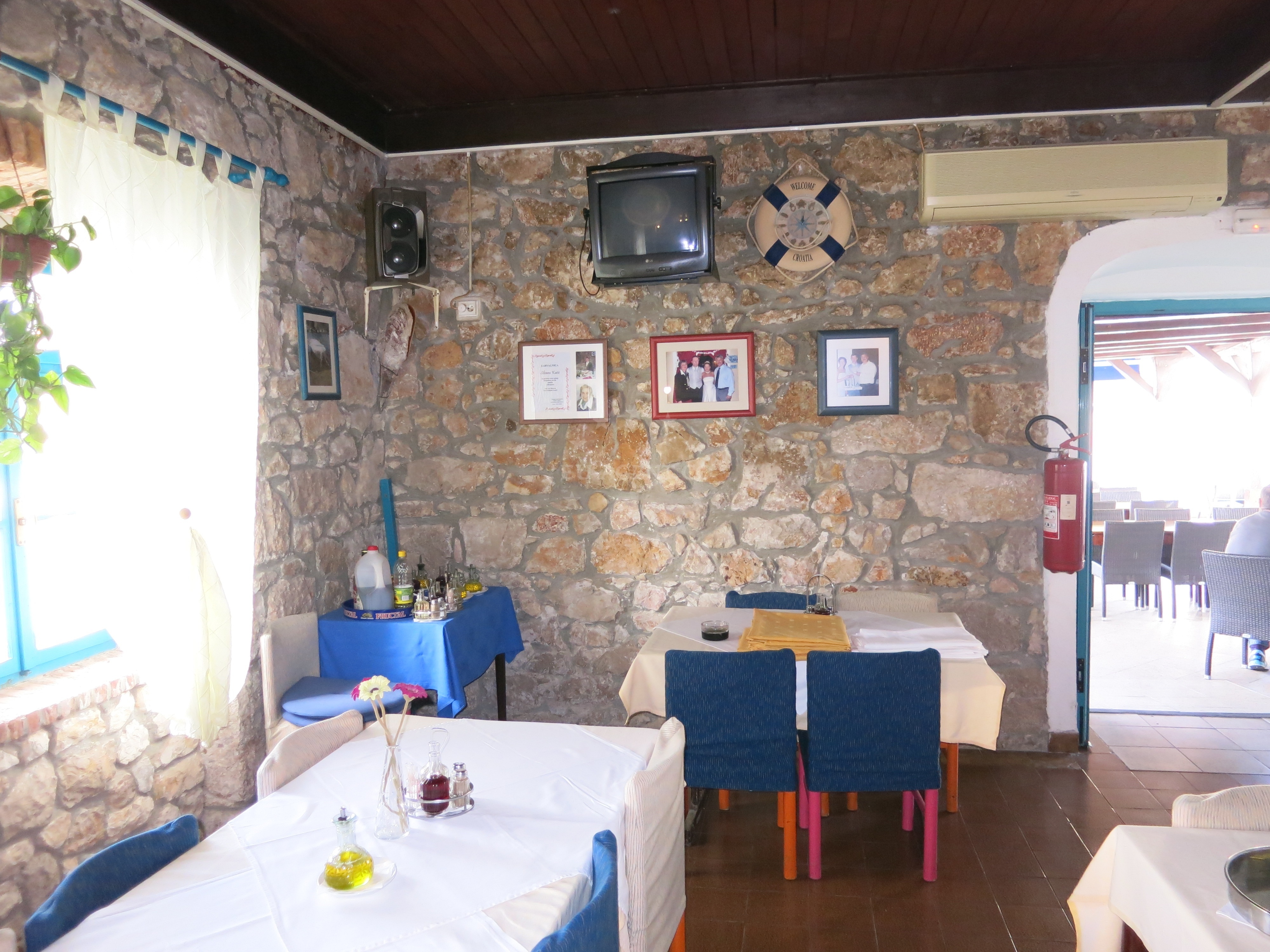 Dining area at Sidro Restaurant with views of the sea