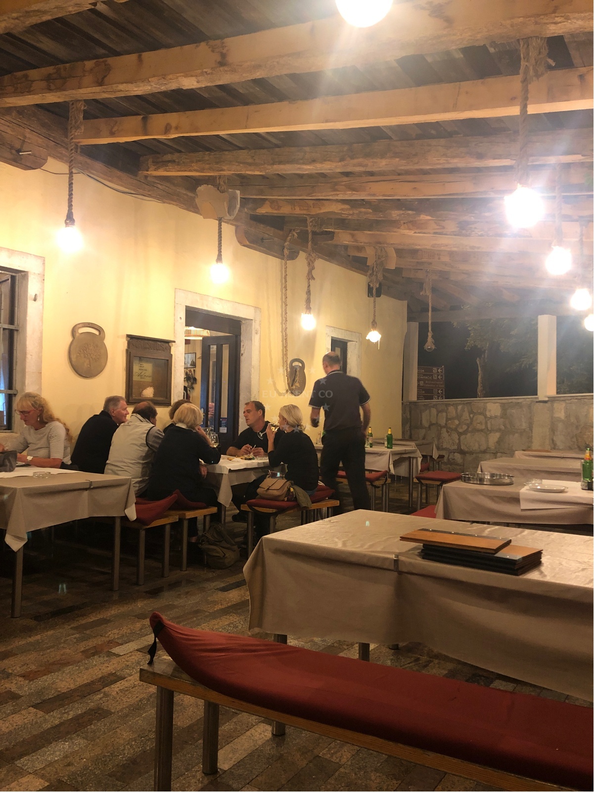 Interior of Restaurant Adria in Osor, Croatia with views of the swinging bridge