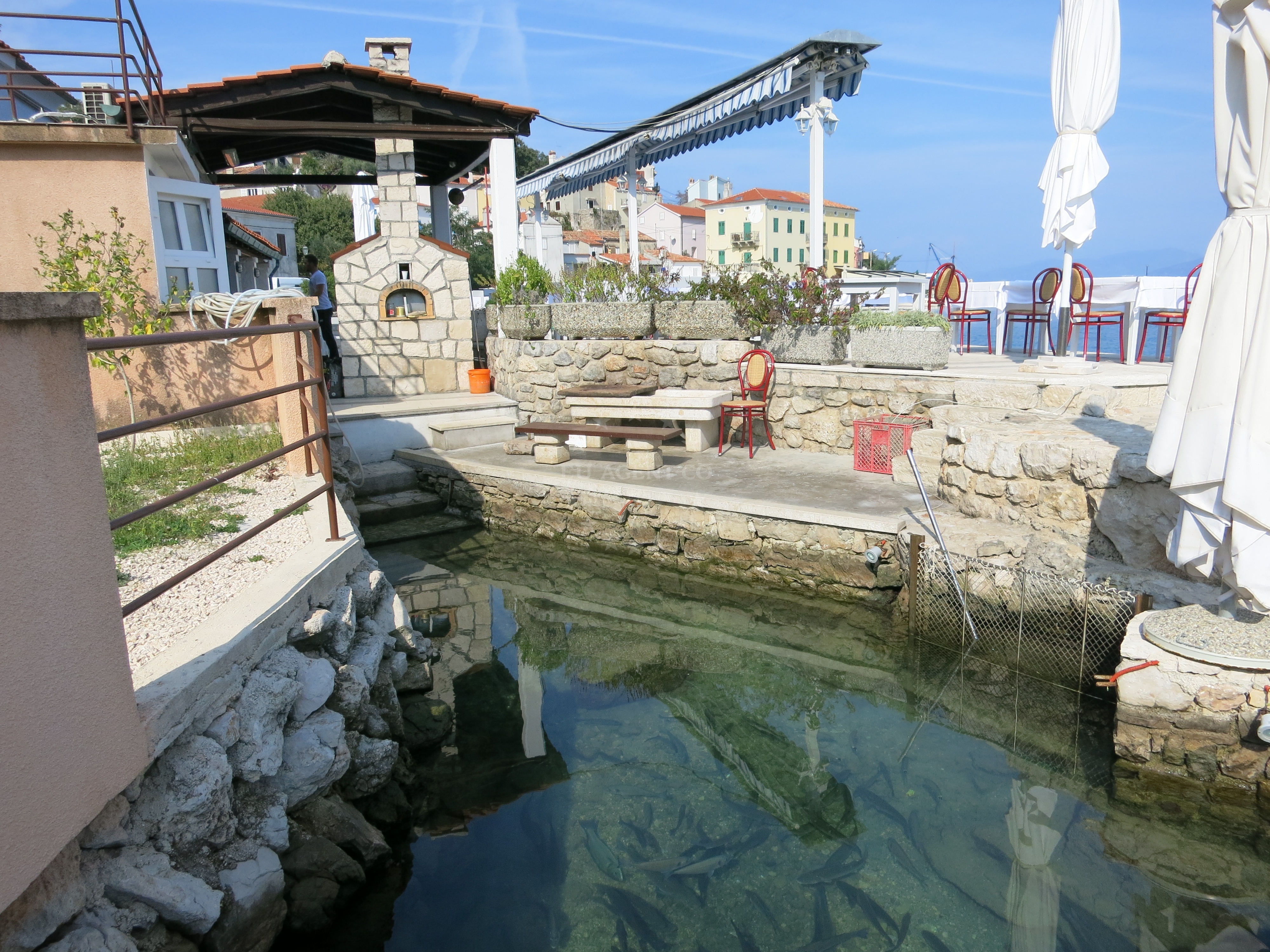 Open-fire cooking at Na Moru restaurant, Valun, Cres, Croatia
