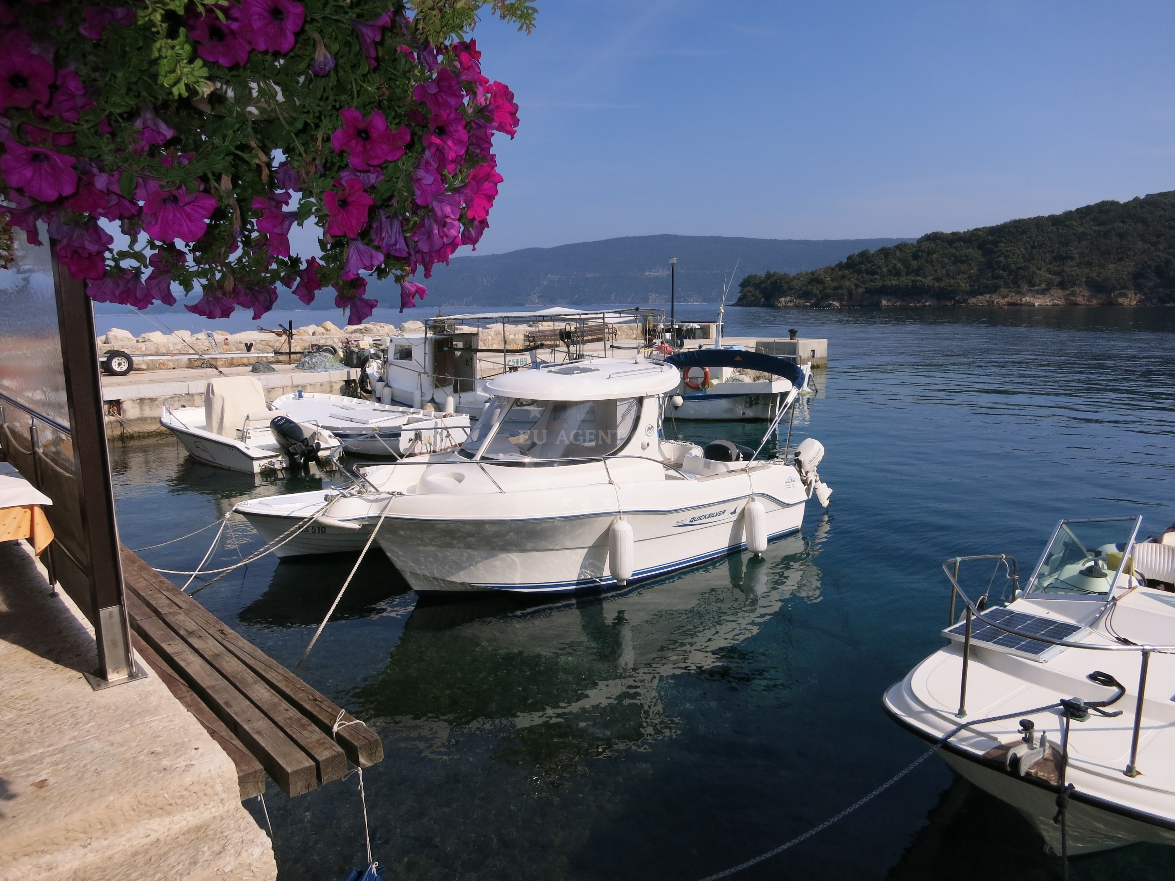 Outdoor seating at San Marco Restaurant near Valun Harbour