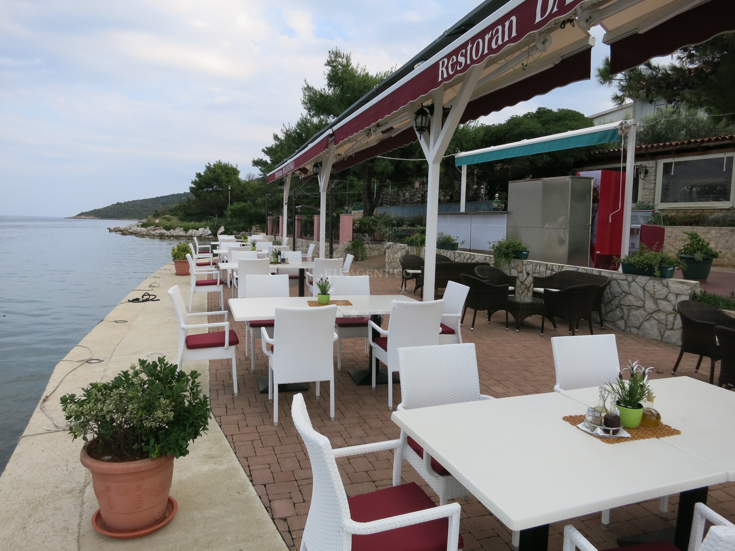 Dalmatinka Restaurant dining area with views of Ilovik Harbor
