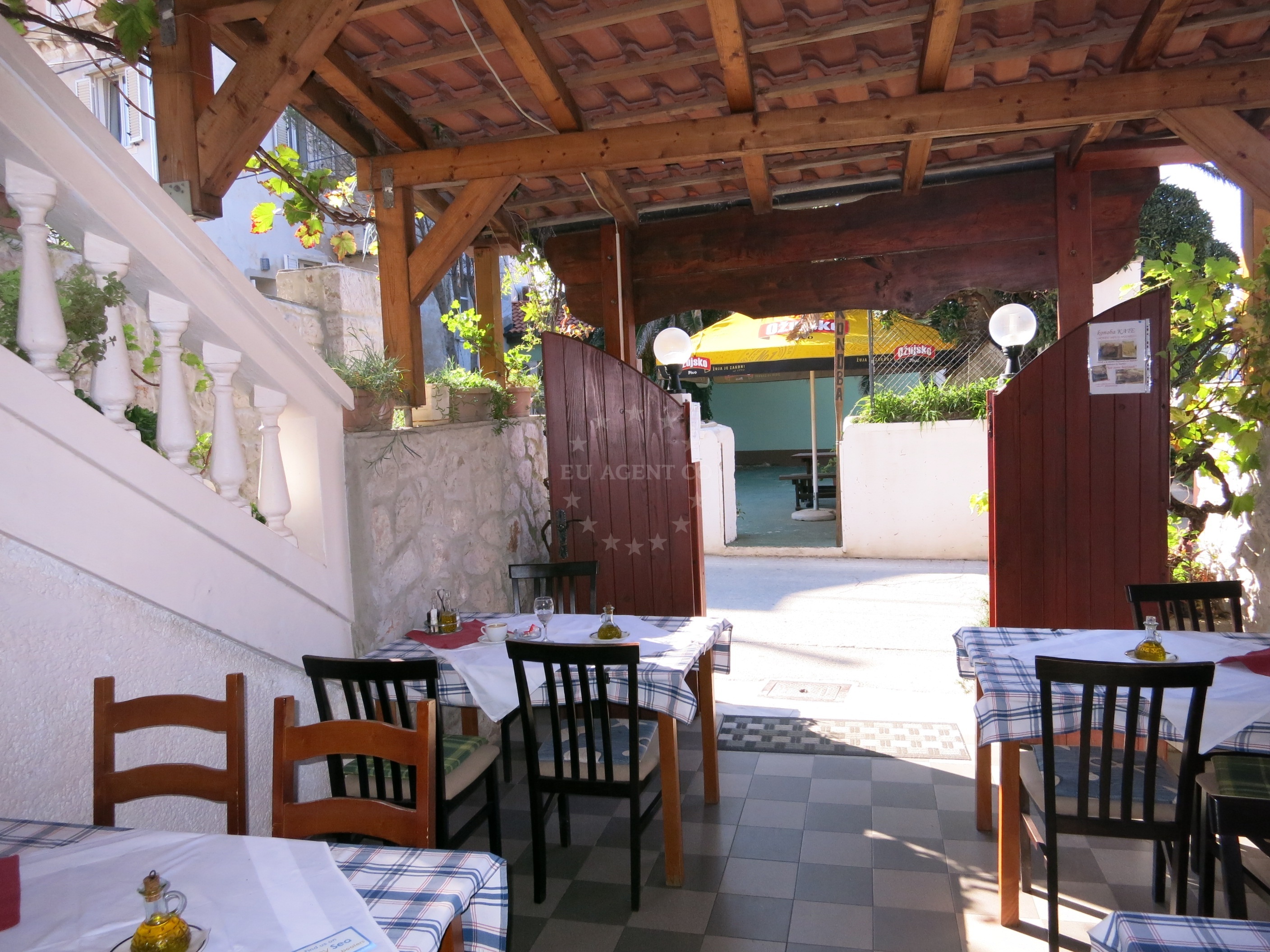 Cozy dining area at Konoba Kate with panoramic sea views