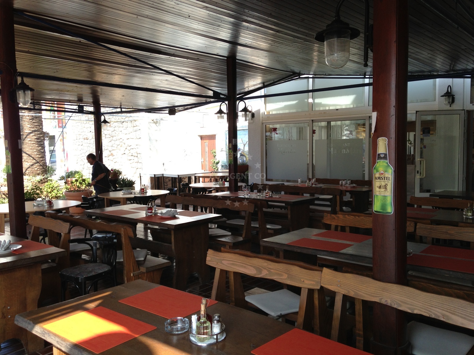 Dining area at Marina Restaurant, Losinj, Croatia with Adriatic Sea backdrop