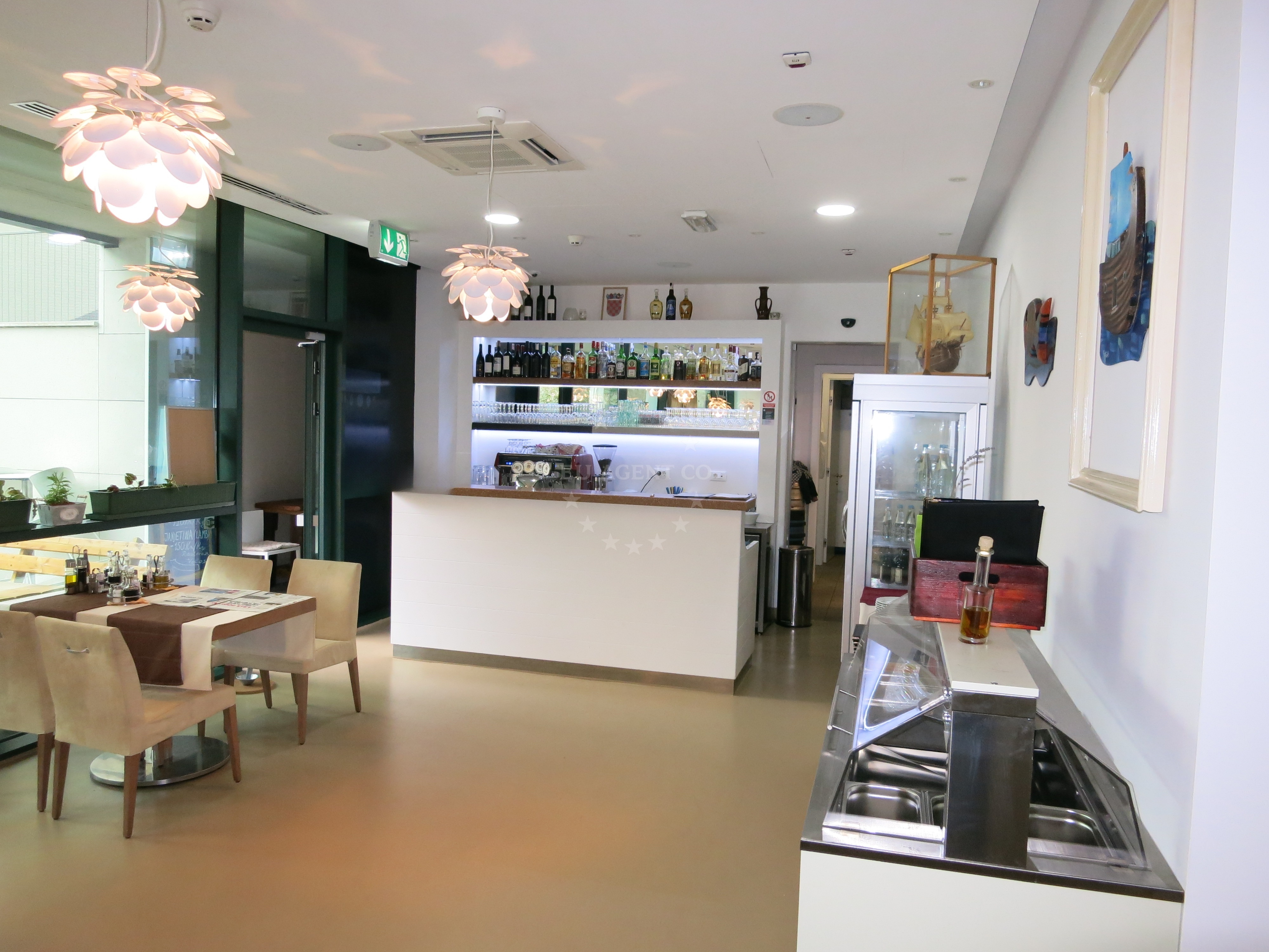 Charcoal-grilled meat and homemade pasta at Restaurant Volos