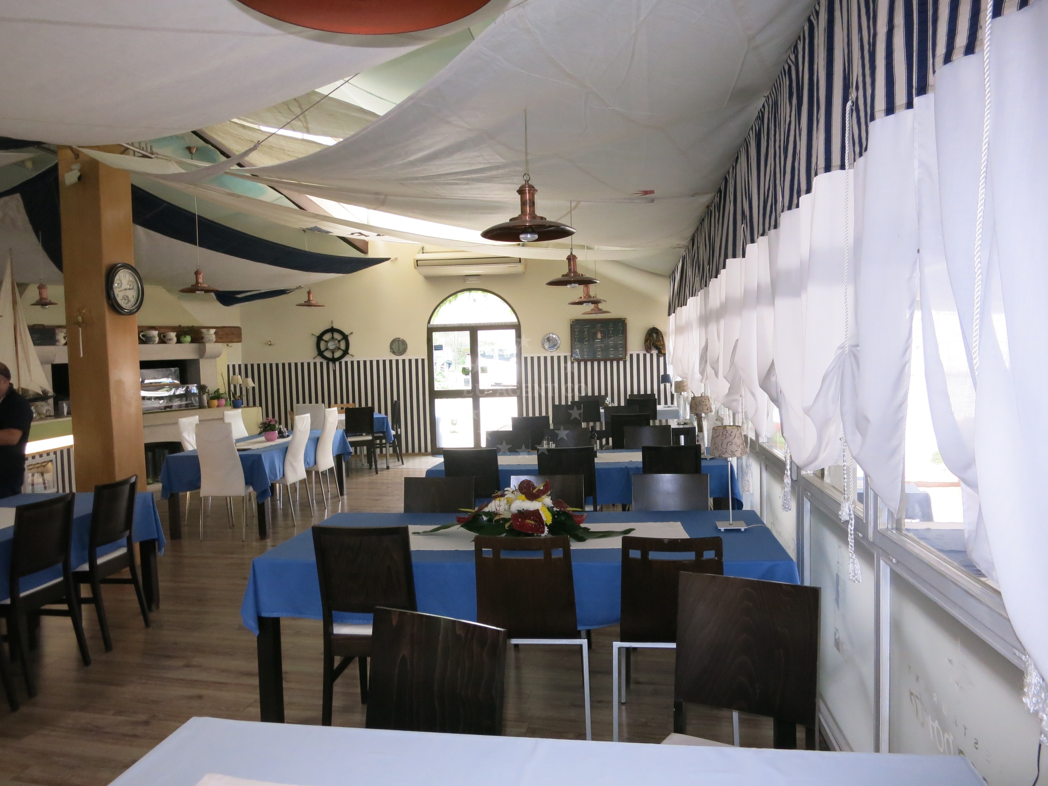 Restaurant exterior with Adriatic Sea backdrop