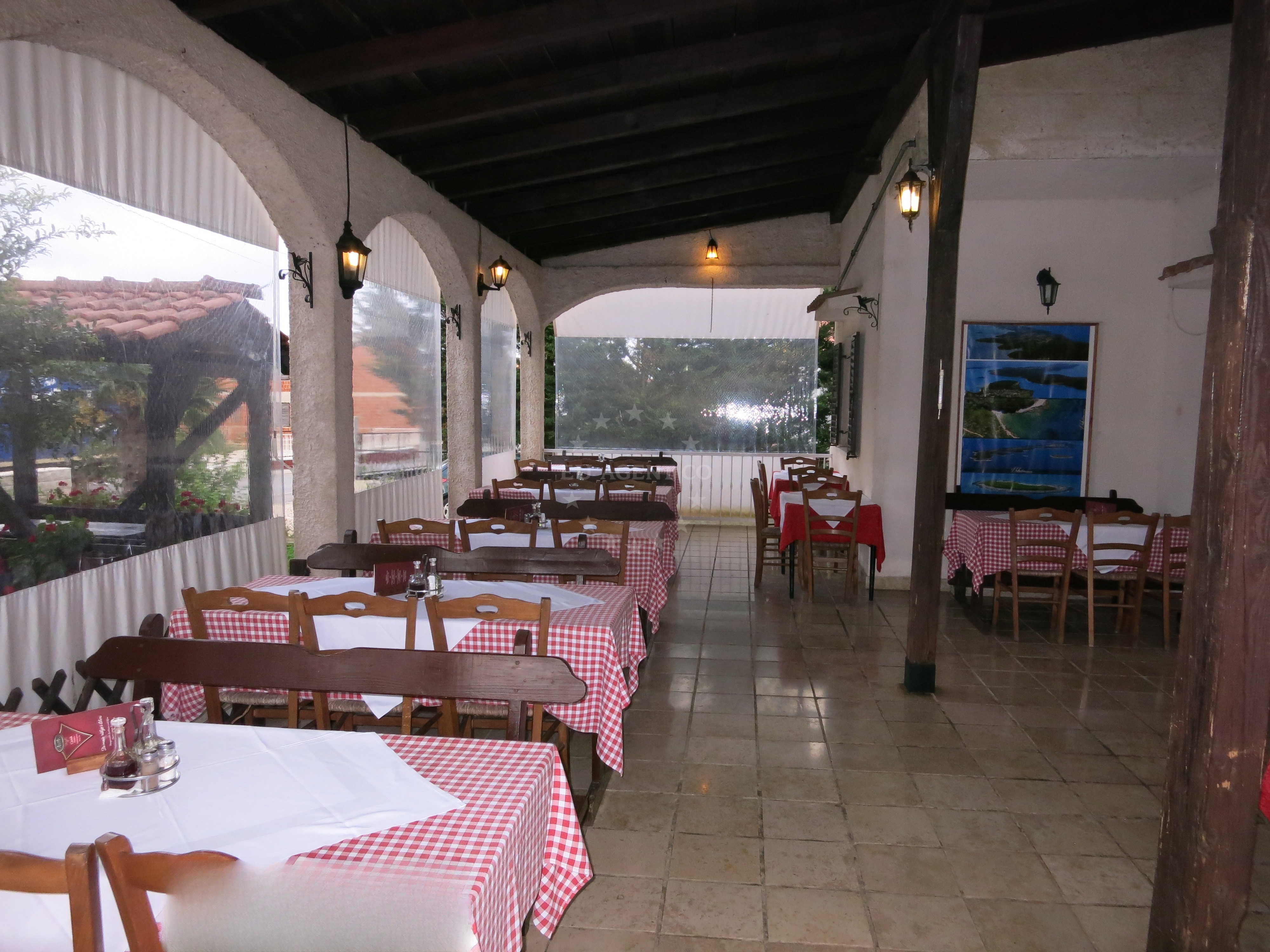 Dining area at Konoba Istriana with views of Pomer's coastal landscape