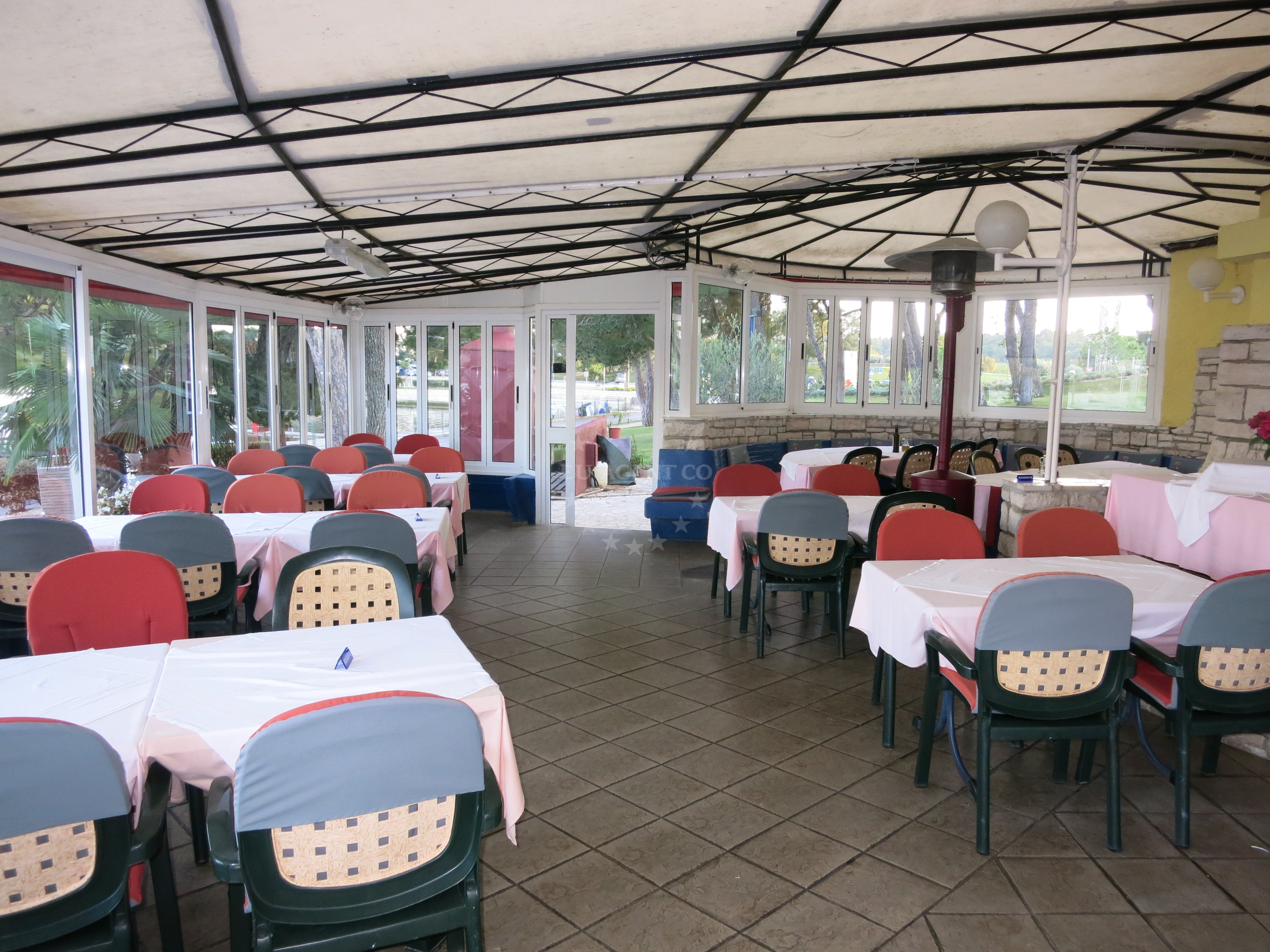 Restaurant interior with marina view, Poreč