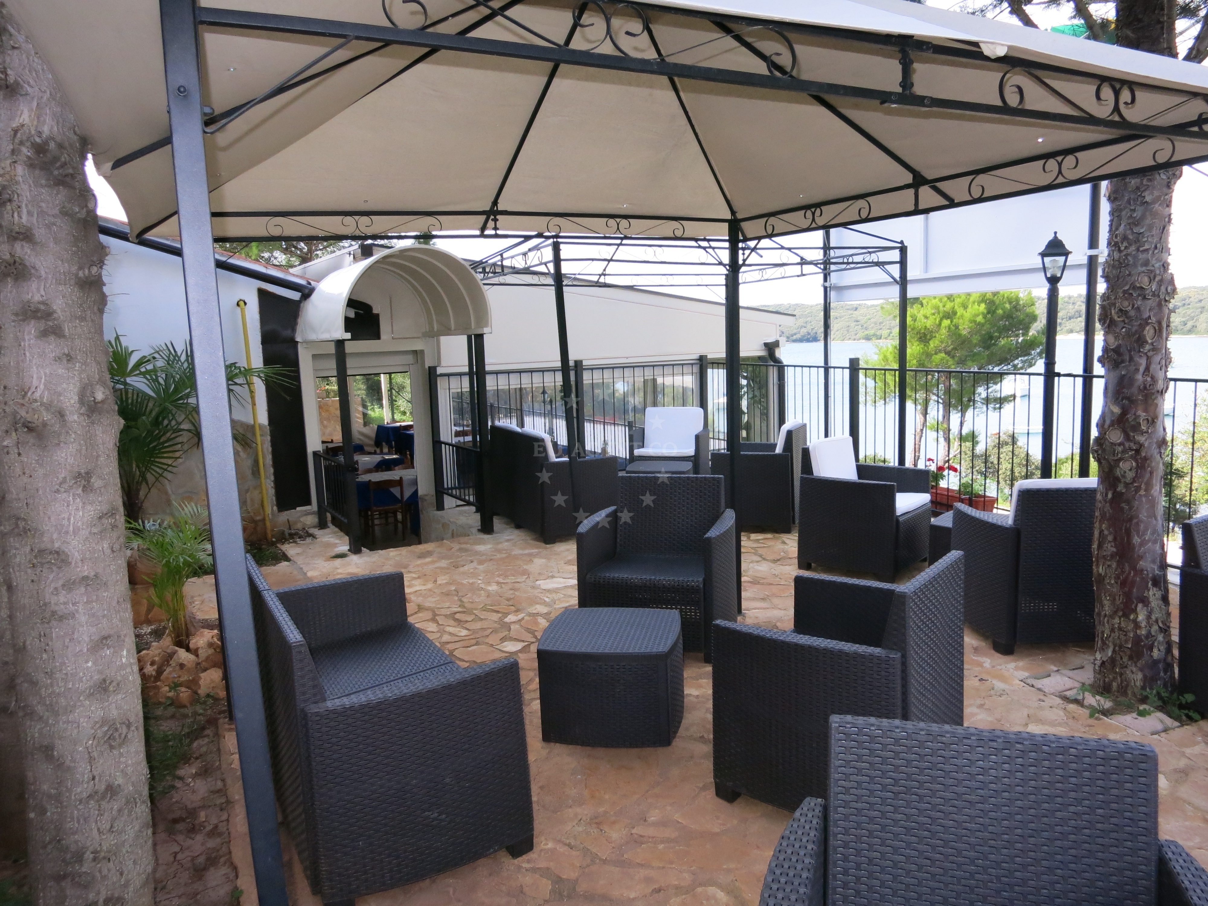 Dining area at La Gondola d' Oro with Adriatic Sea backdrop