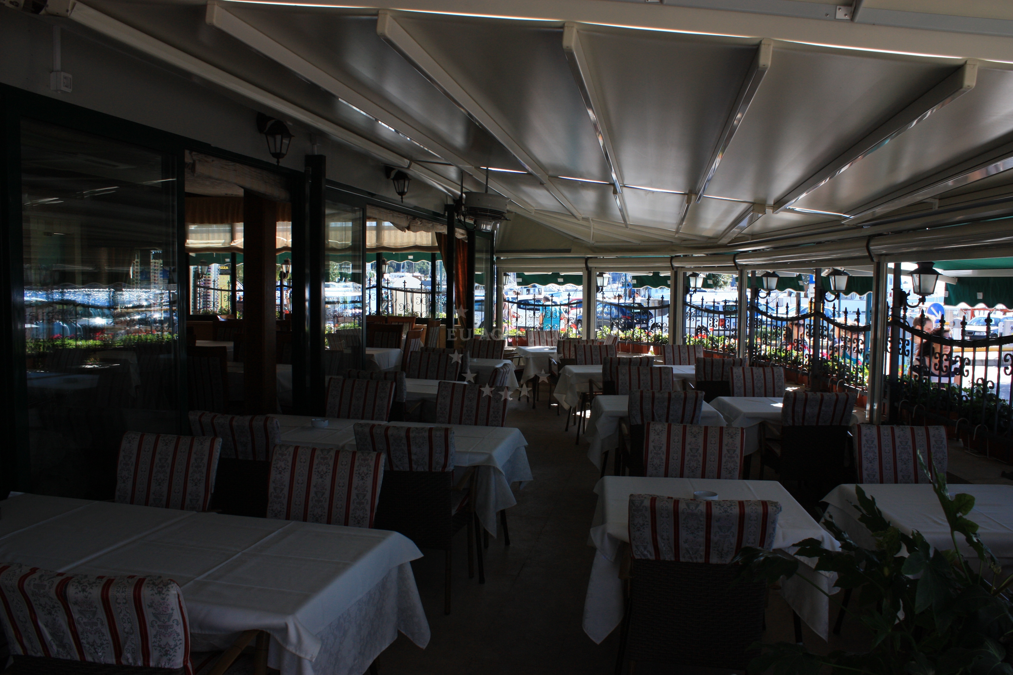 Dining area at Amfora Restaurant, showcasing traditional Croatian decor and seafood dishes.