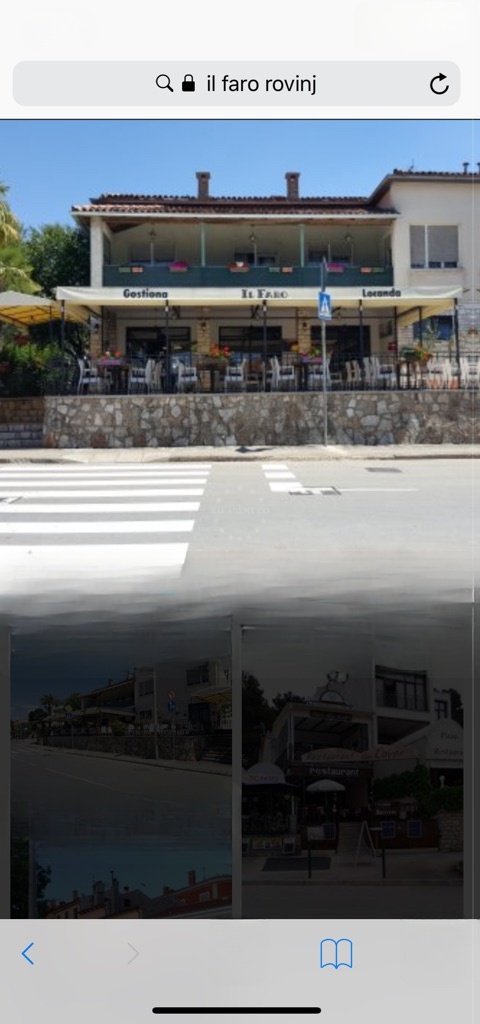 il FARO Restaurant in Rovinj, Croatia, overlooking the Adriatic Sea with a view of nearby marinas.