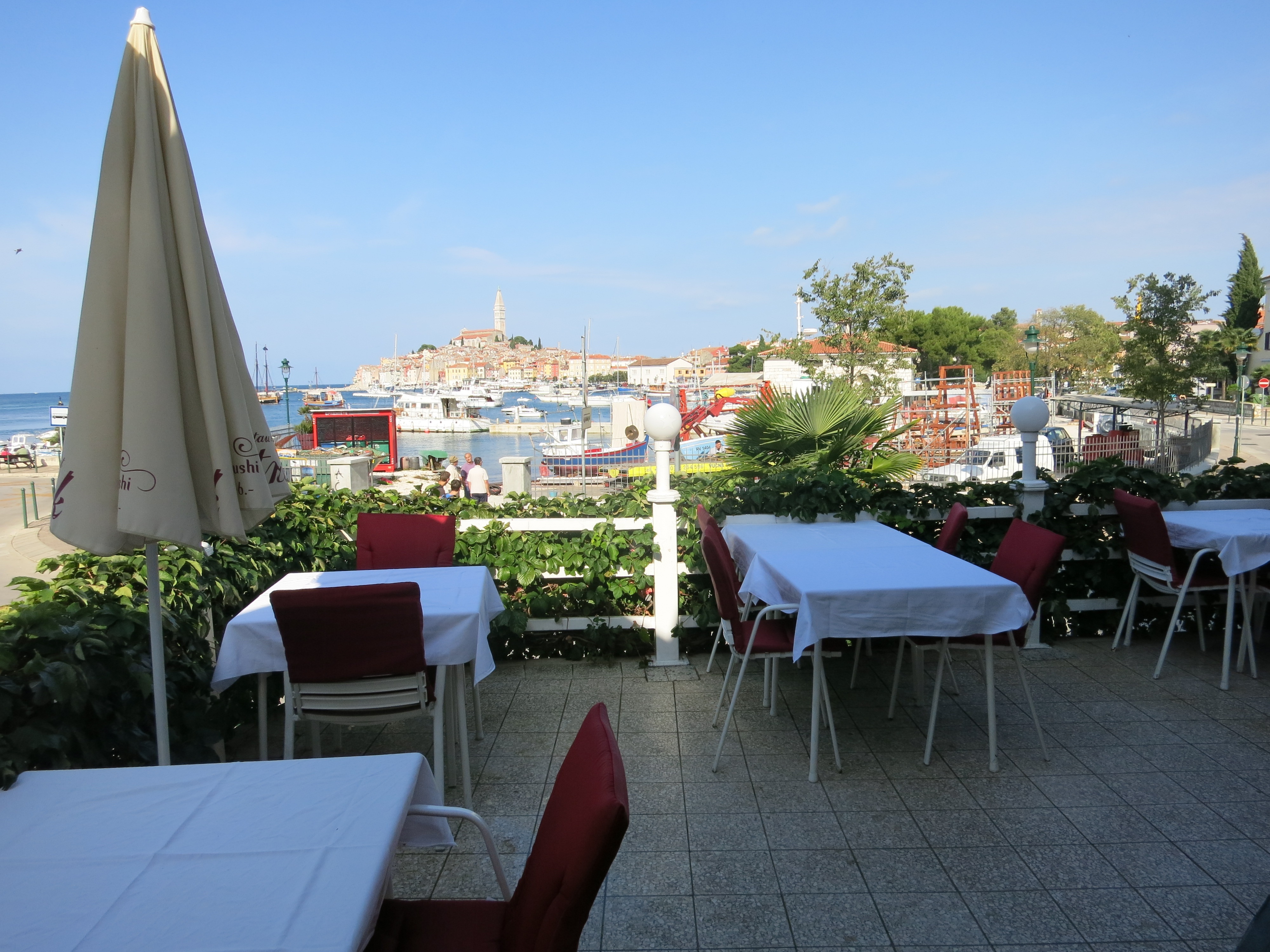 Dining area at Pastrik Restaurant overlooking the sea