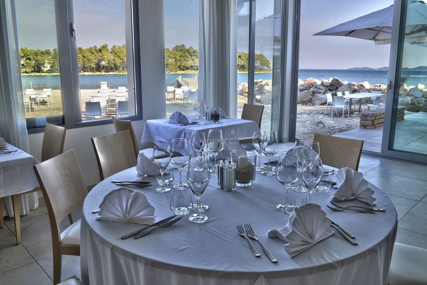 Dining table at Restaurant More with panoramic sea view