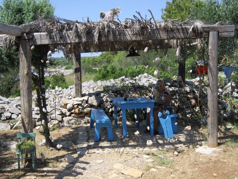 Outdoor seating area at La Spuz overlooking the Adriatic