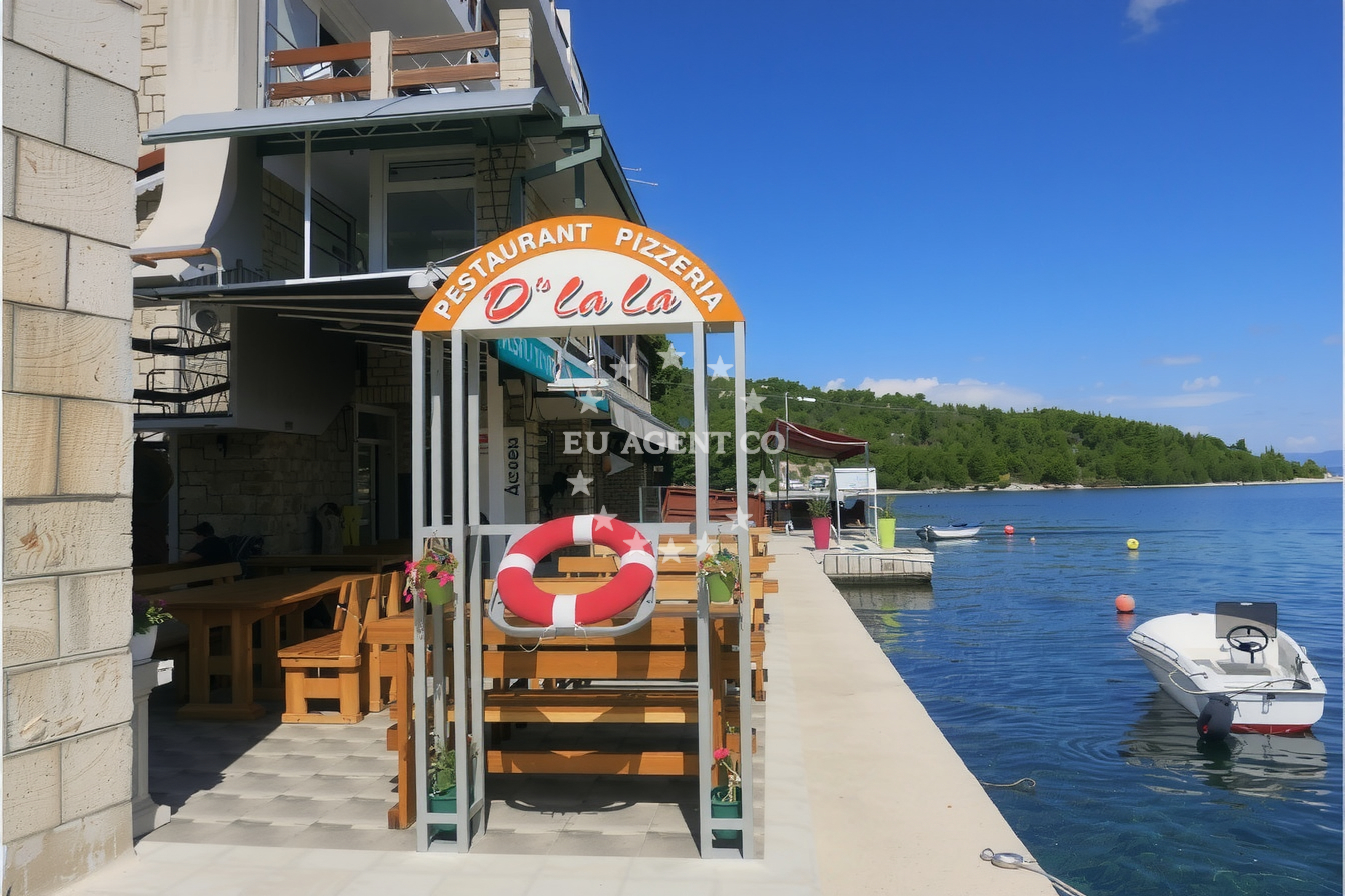Konoba Tilago, a simple tavern on Dugi Otok, offering traditional Croatian cuisine with views of the Adriatic Sea