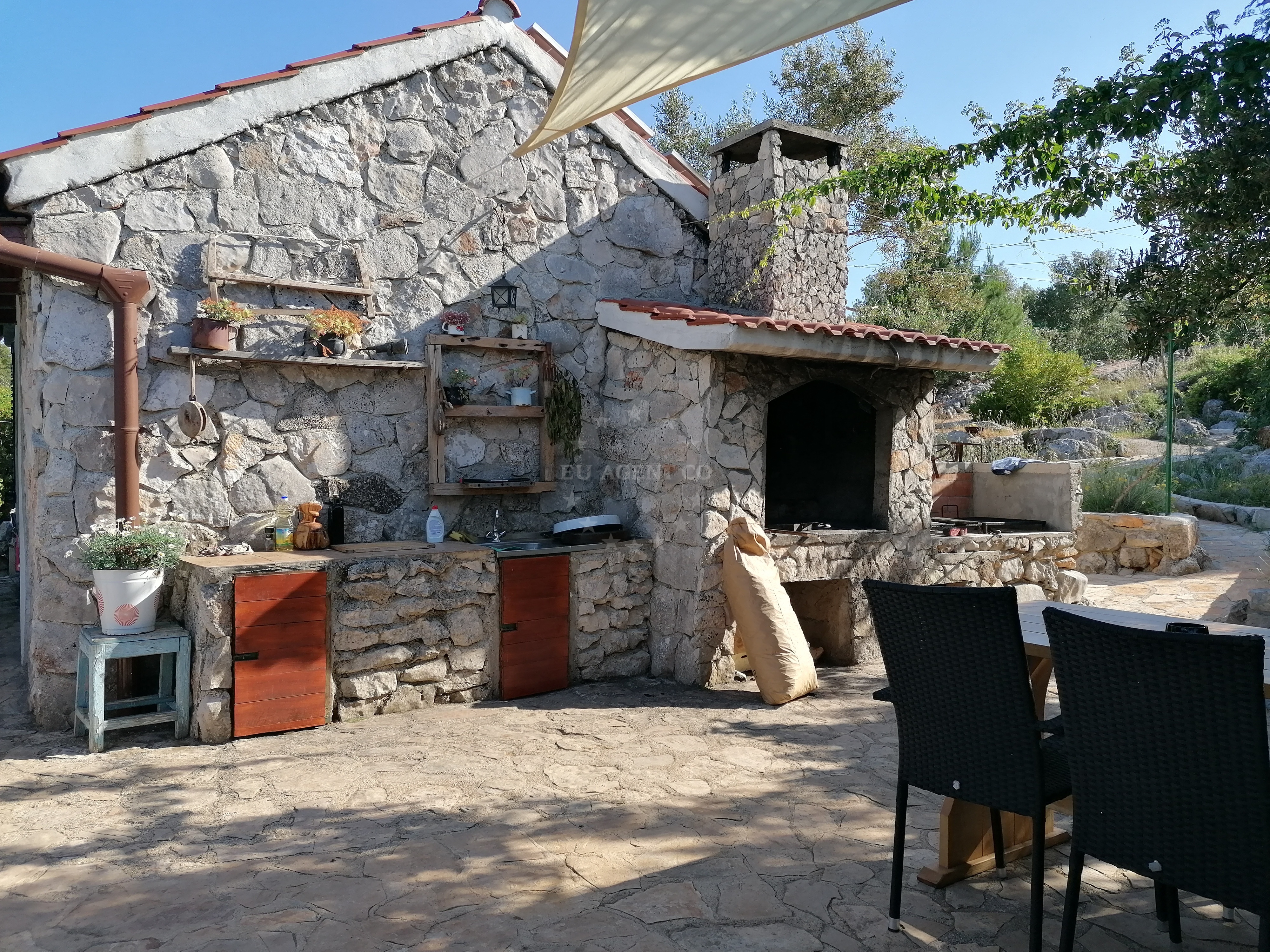 Dining area at Konoba Skeba with views of Magrovica Bay, Telascica Nature Park