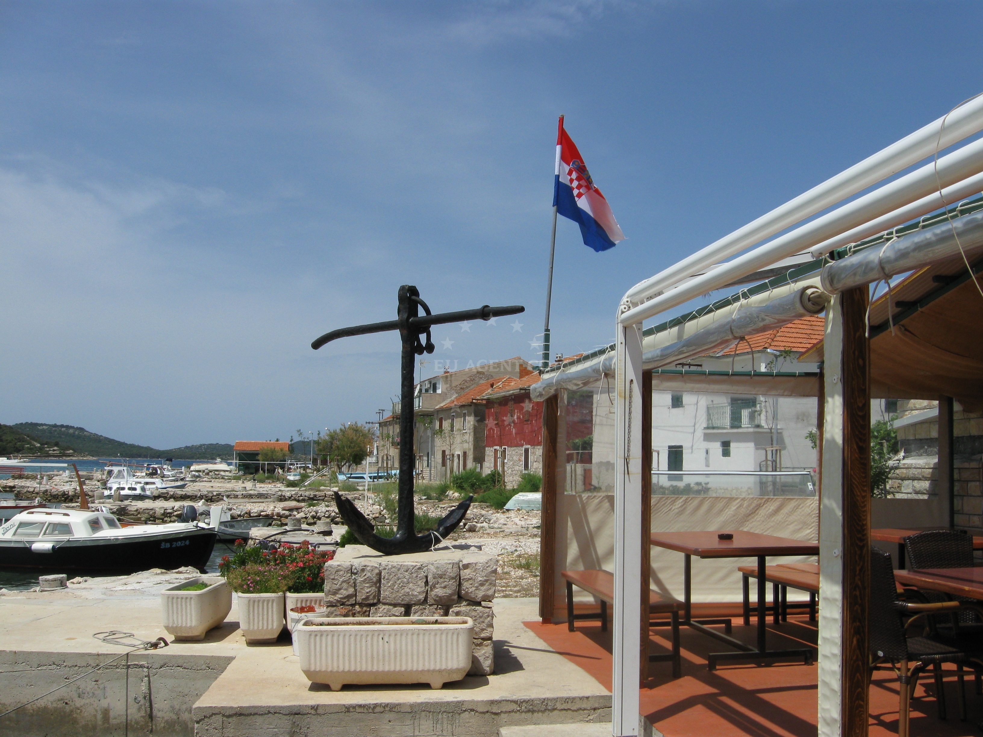Neptun Restaurant exterior overlooking the Adriatic Sea on Kaprije Island