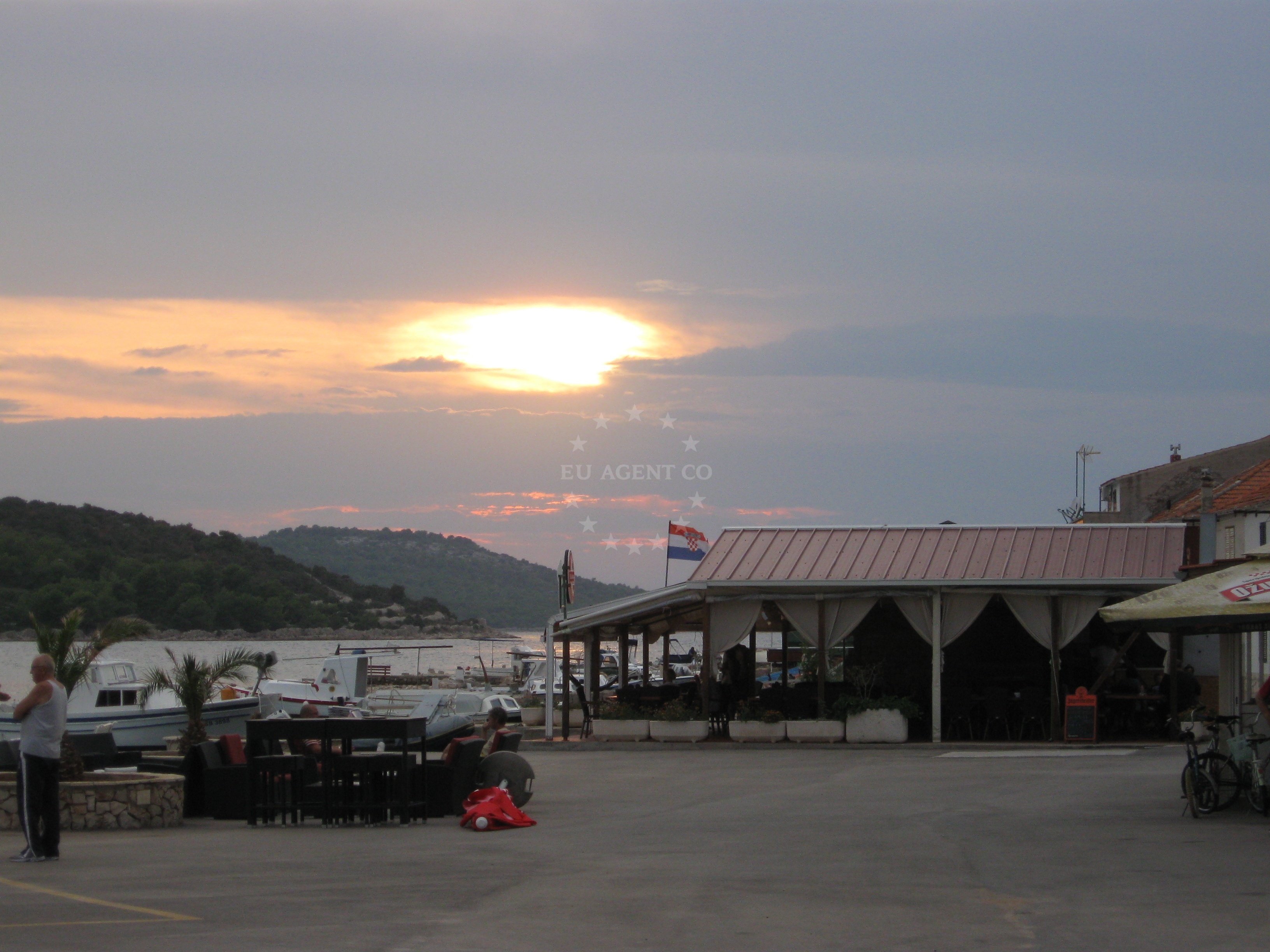 Seaside dining area at Neptun Restaurant with views of the open sea