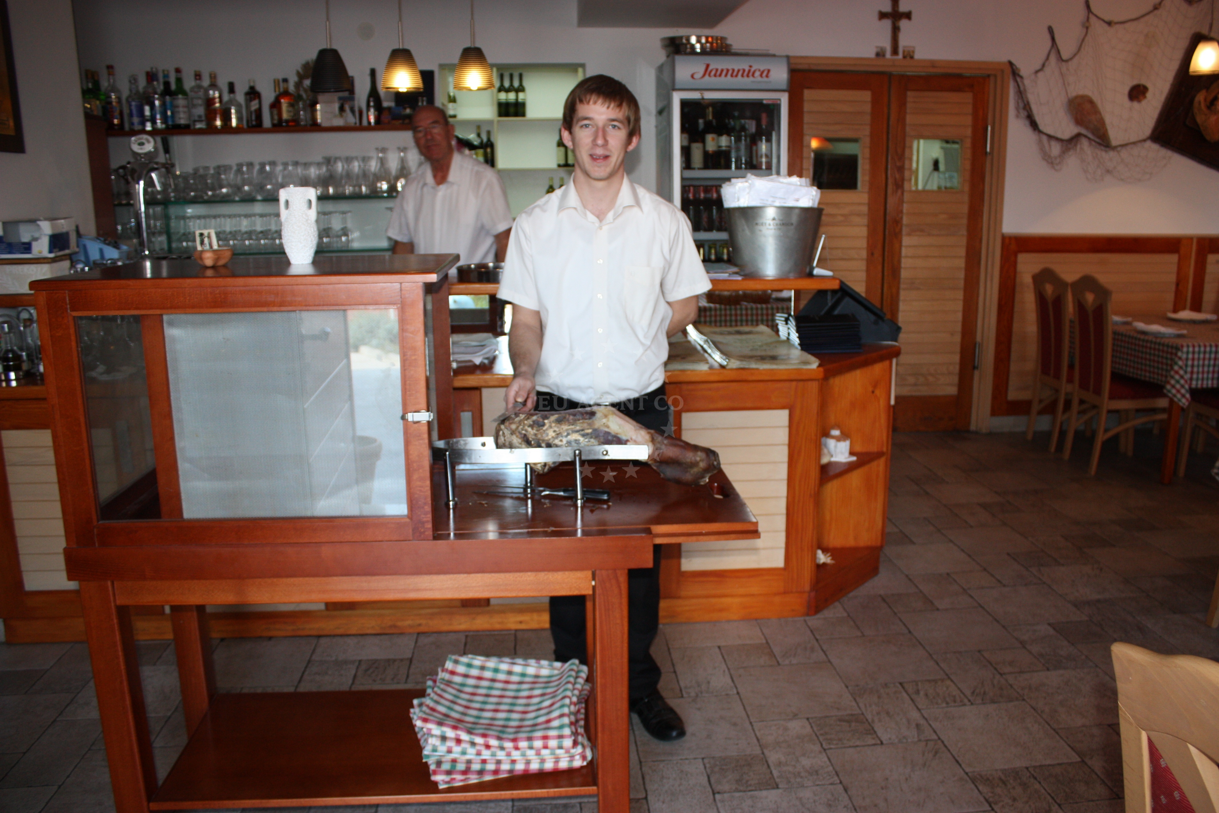 Outdoor seating area at Taverna Joso overlooking the sea