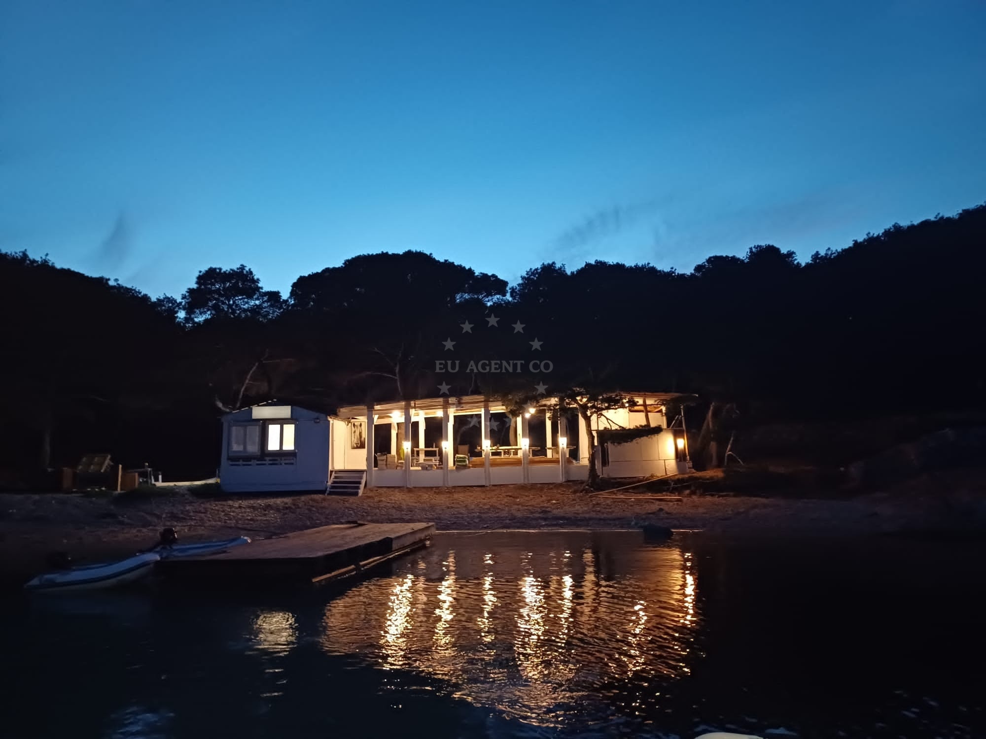 u.o Lagani Restaurant on Vrgada Island with turquoise waters and pine forest backdrop
