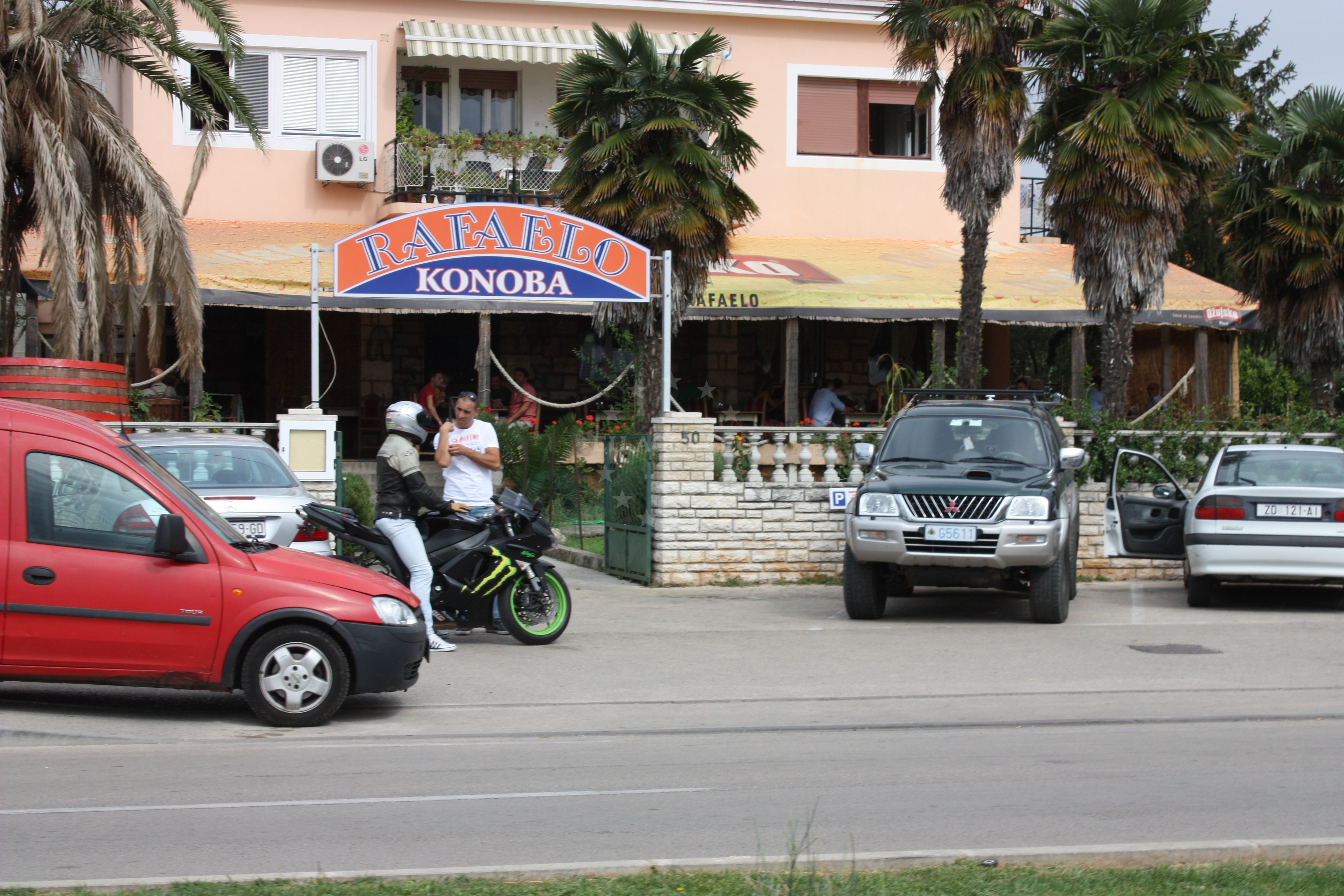 Rafaelo Restaurant overlooking Zadar's harbor with boats in the distance