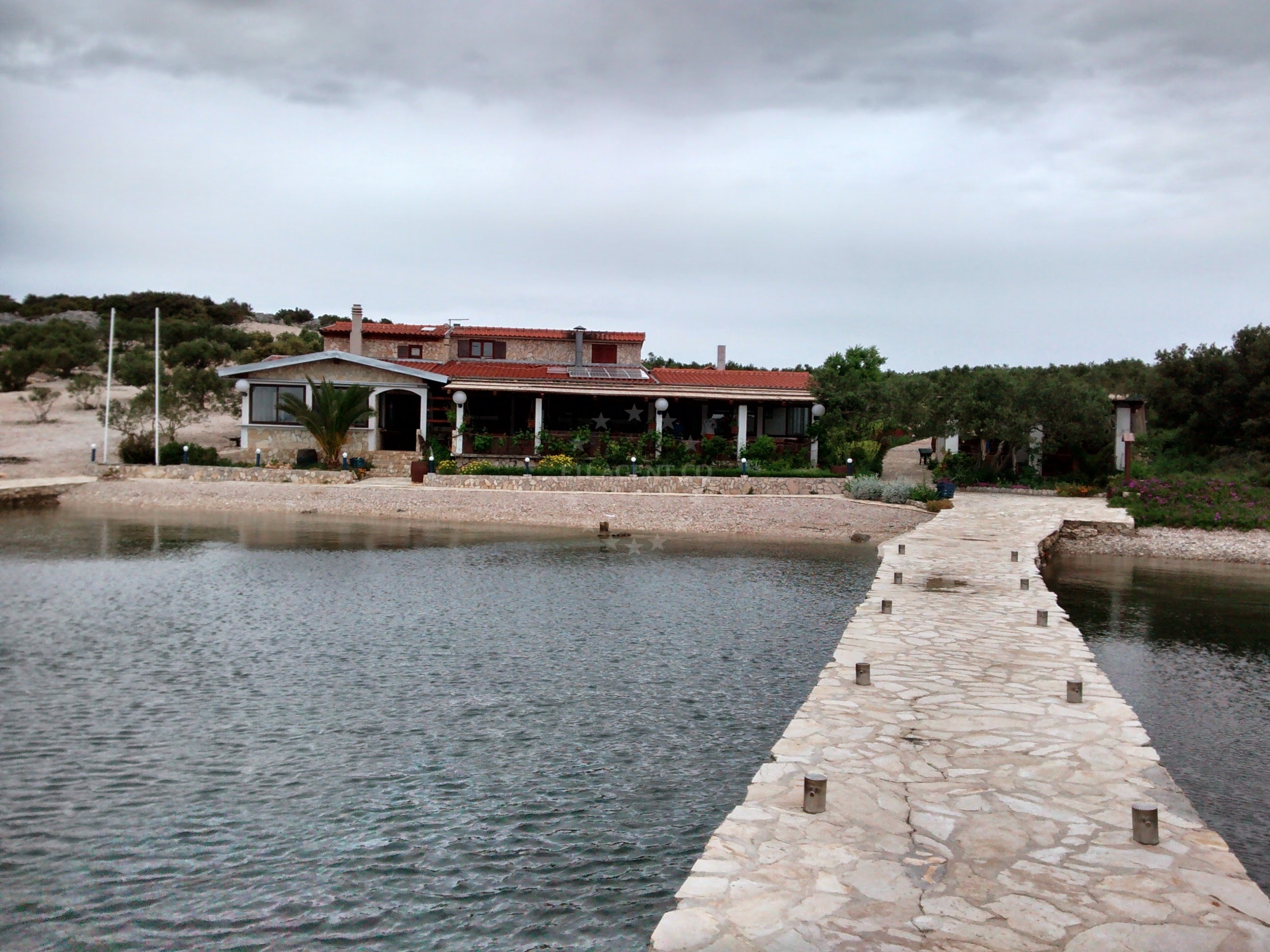 Dining area at Restaurant Zminjak overlooking the Adriatic Sea, Zminjak Island