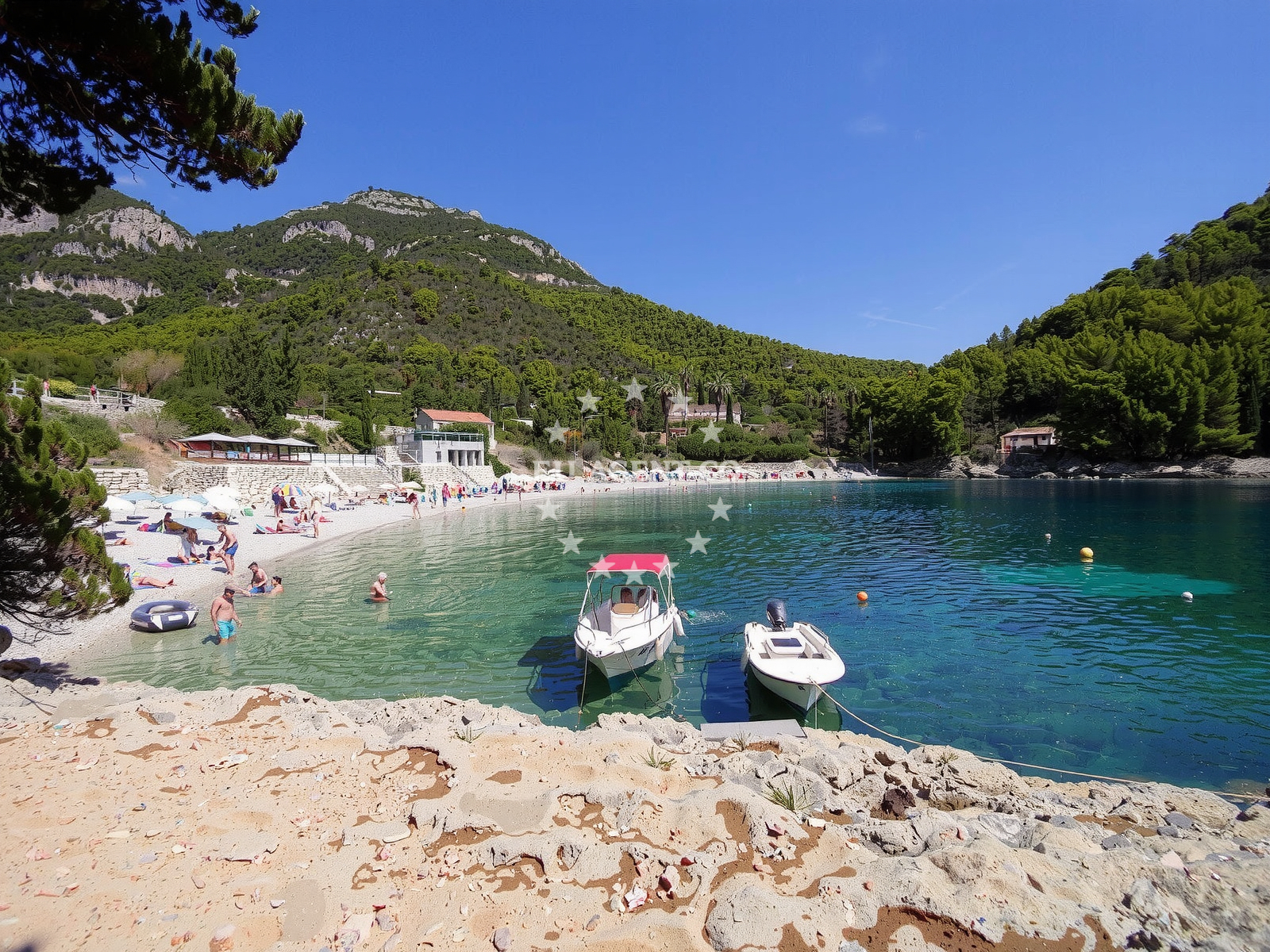 Pupnatska Luka anchorage near Korcula, Croatia, with boats moored along the shore