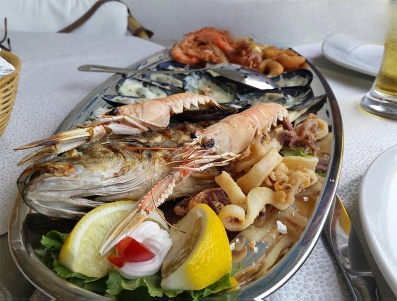 Konoba Bata restaurant in Vela Luka, Korcula, overlooking the sea and park