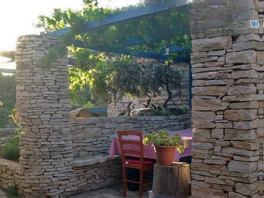 Konoba Gulin restaurant in Vela Luka, Korcula, Croatia with stone walls and traditional decor