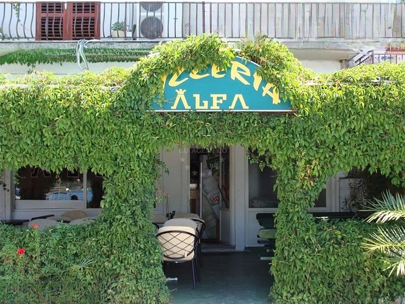 Pizzeria Alfa restaurant on the shore in Vela Luka, Korcula, Croatia