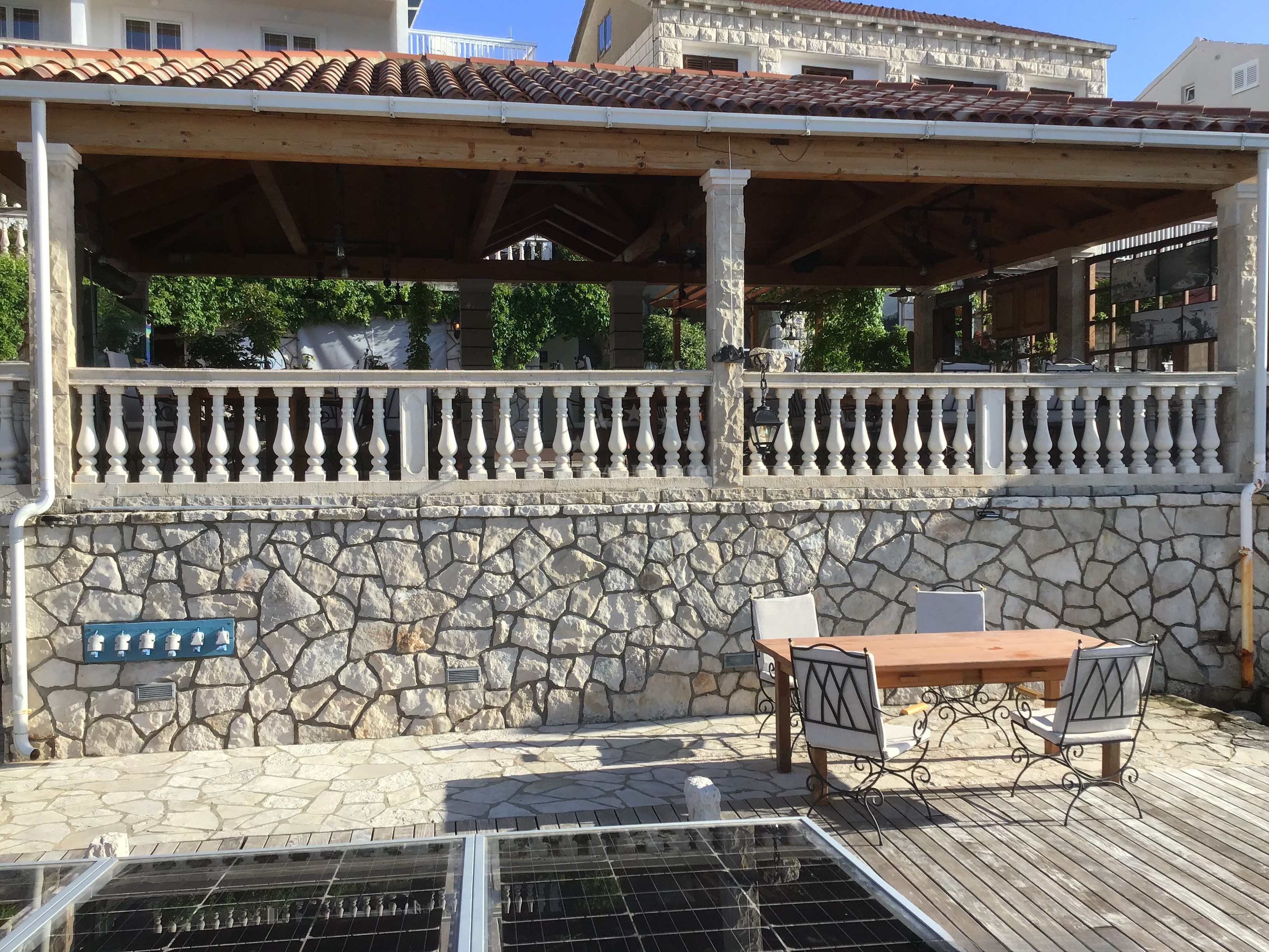 View of the restaurant and nearby marina in Polace, Mljet
