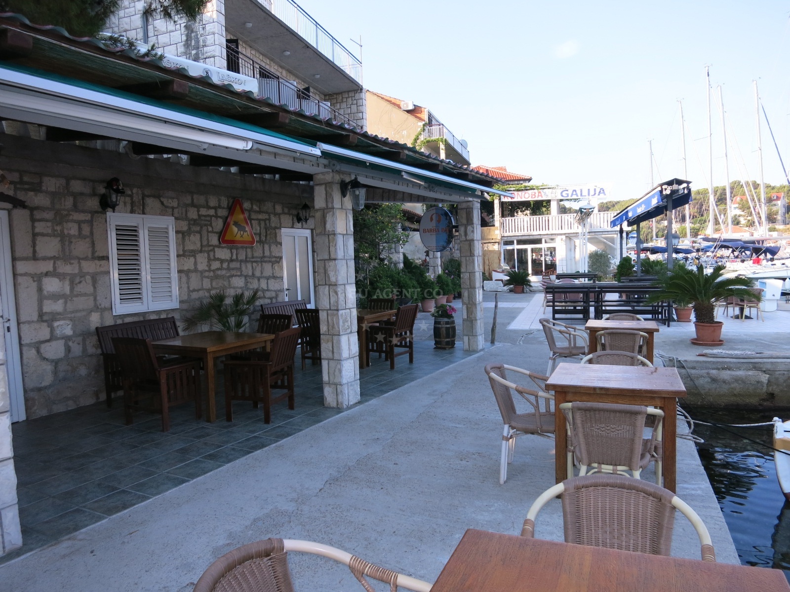 Dining area at Barba Ive Restaurant, Pomena, Mljet, overlooking the Adriatic Sea