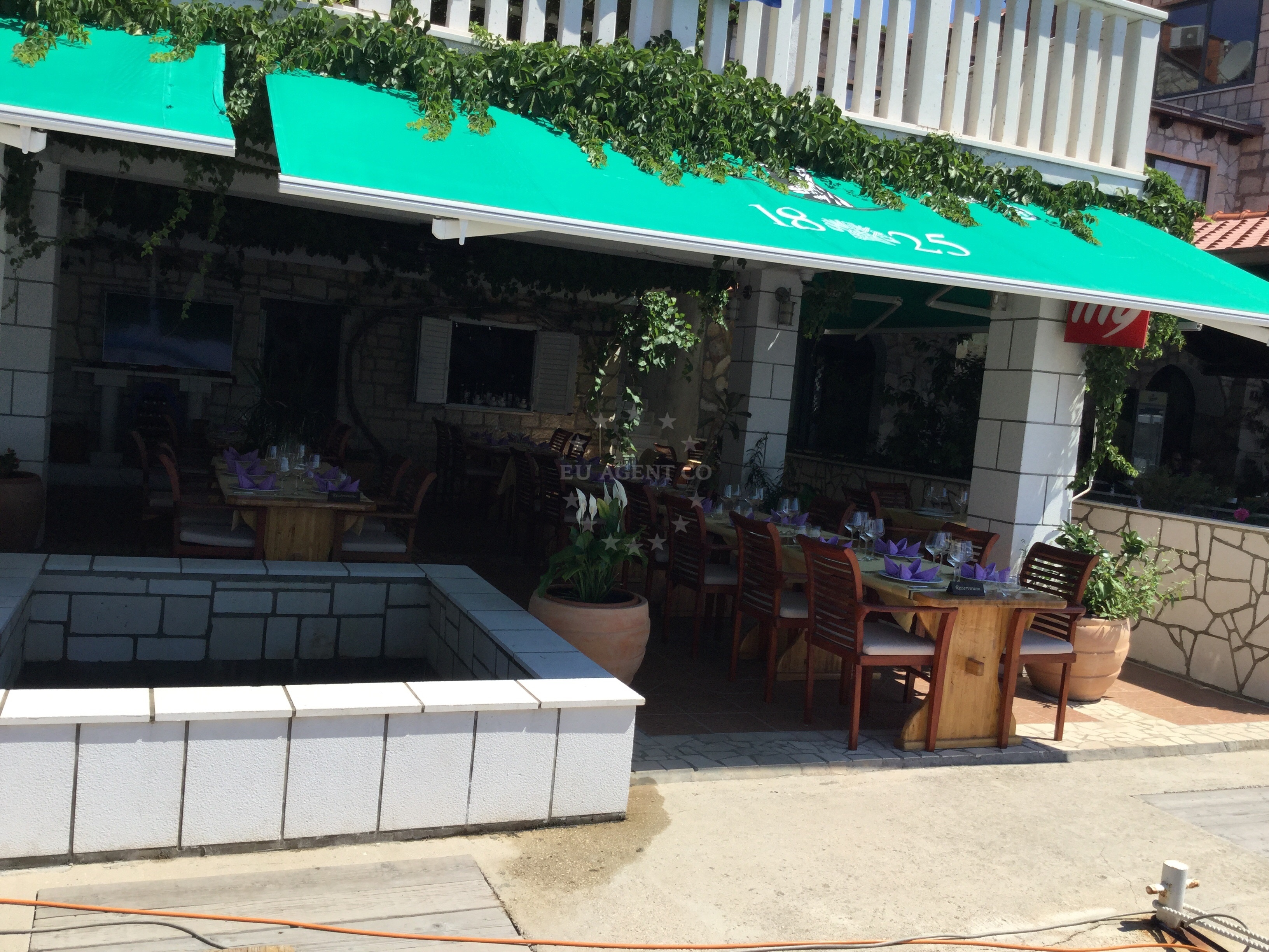 Restaurant exterior with panoramic views of Mljet's coastline