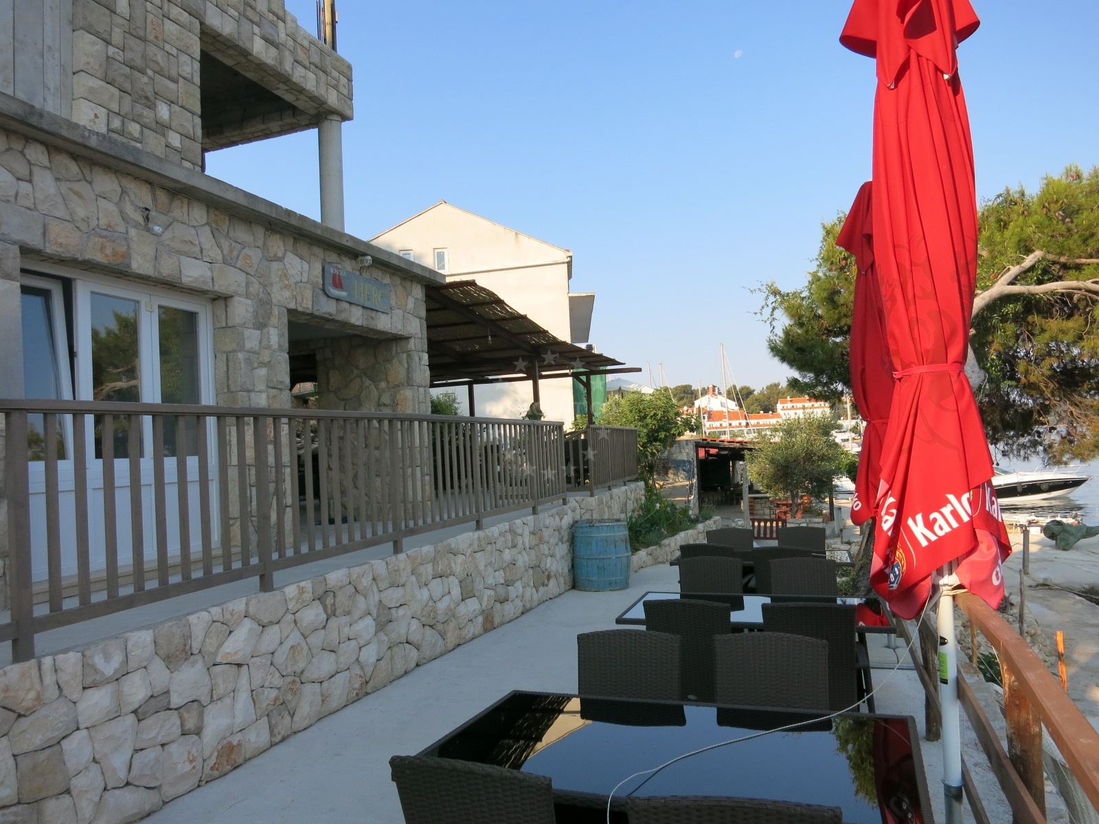 Konoba Herc restaurant in Pomena, Mljet with yachts moored at the waterfront