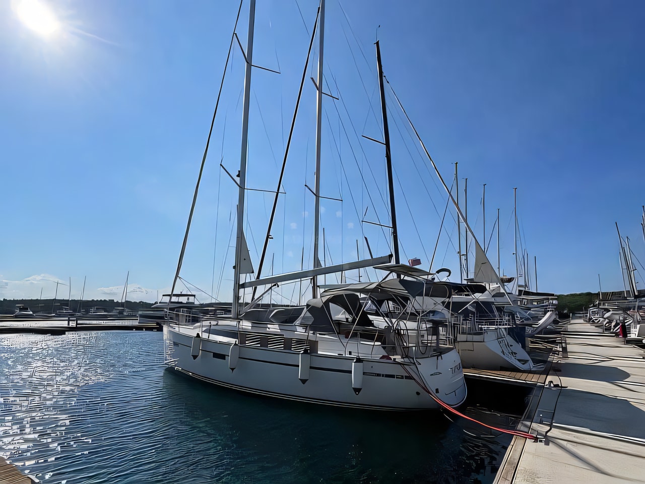 Exterior overview of Bavaria 37 sail boat for charter from Sibenik Marina Mandalina in the Kornati sailing area Croatia