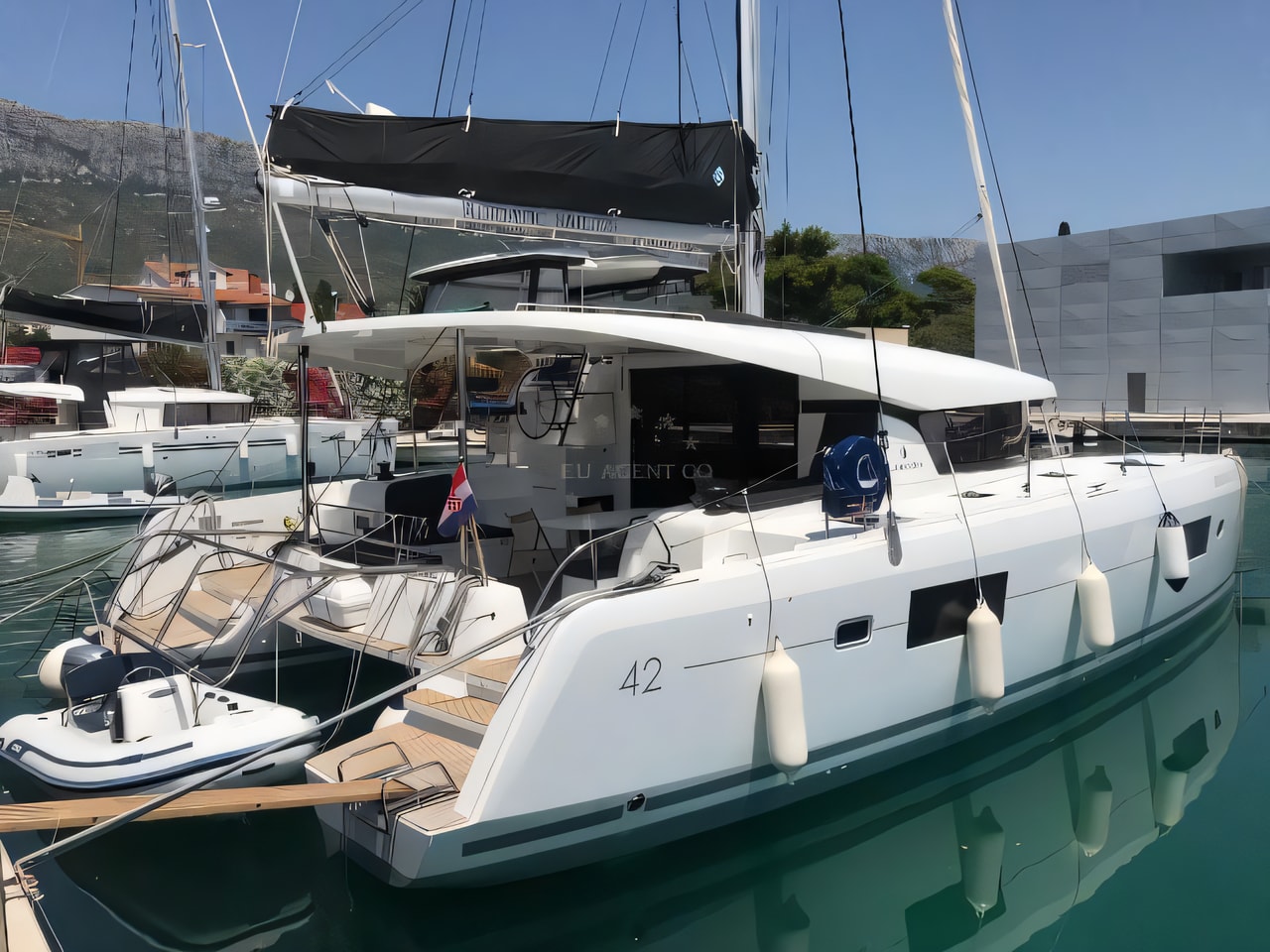 Exterior overview of Lagoon 42 owner version catamaran for charter from Kastela Gomilica Marina in the Split sailing area Croatia