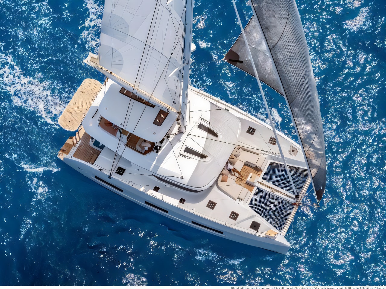 Exterior overview of Lagoon 55 luxury owner version catamaran for charter from Split Marina Mornar in the Split sailing area Croatia